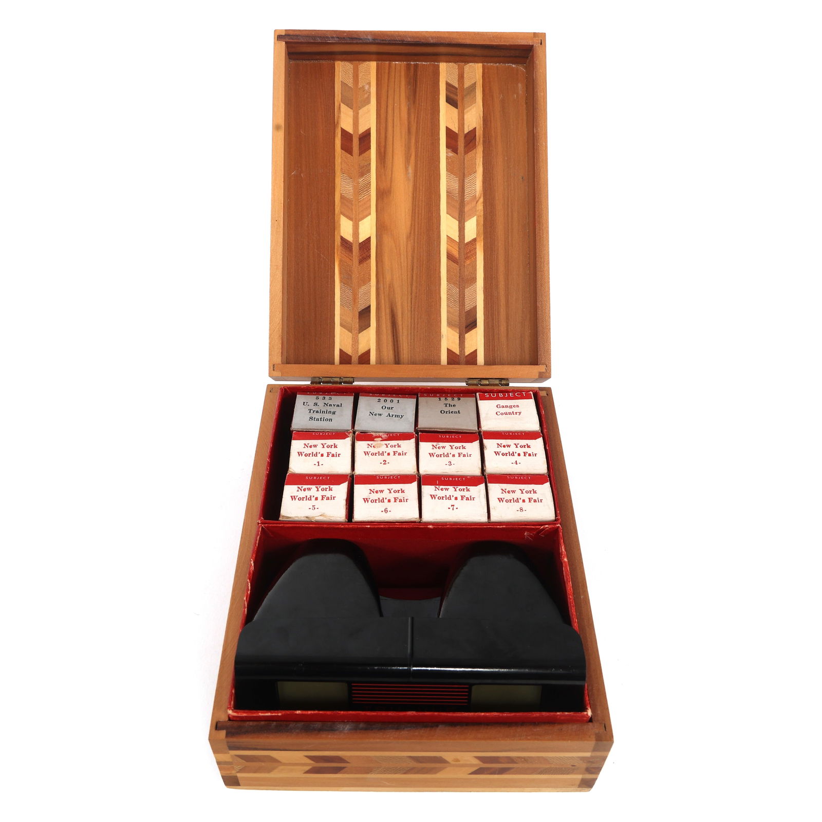 NEW YORK WORLD'S FAIR 1939 TRU-VUE FILMSTRIPS & VIEWER: NEW YORK WORLD'S FAIR 1939 TRU-VUE FILMSTRIPS & VIEWER 1939 New York World's Fair Tru-Vue filmstrips & viewer, with original box. (12) Filmstrips Viewer (4.5" x 2.5" x 1.75