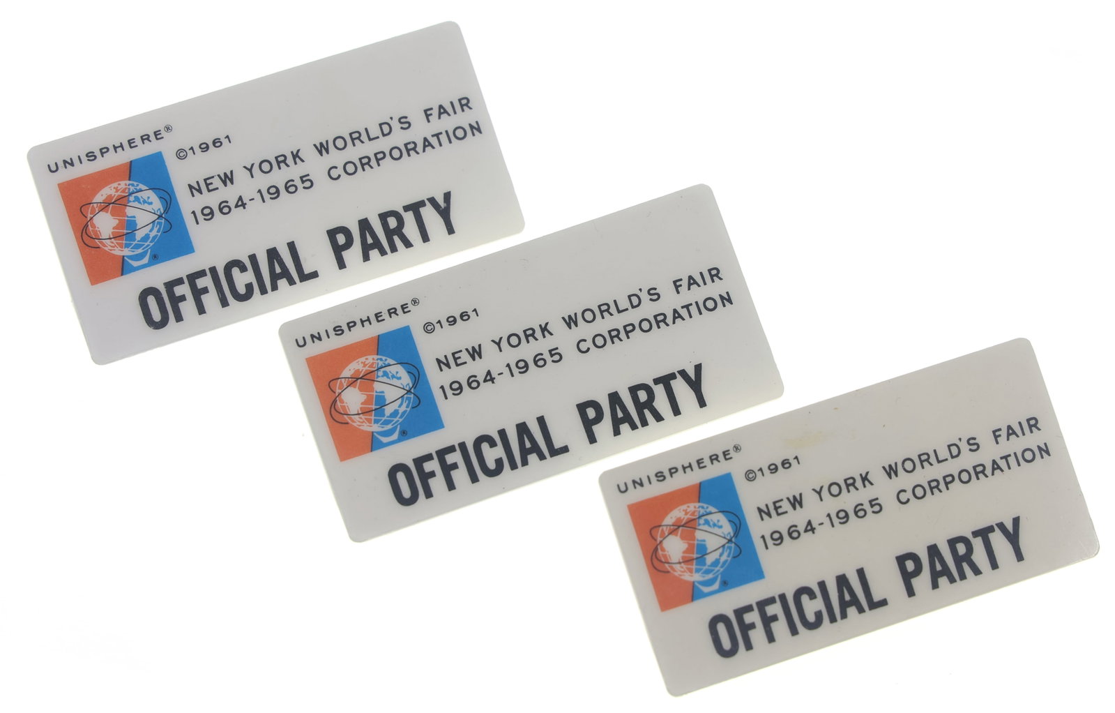 NEW YORK WORLD'S FAIR 1964 OFFICIAL PARTY BADGES: NEW YORK WORLD'S FAIR 1964 OFFICIAL PARTY BADGES 1964-65 New York World's Fair official party badges (3) Size: 2.75" x 1.5"