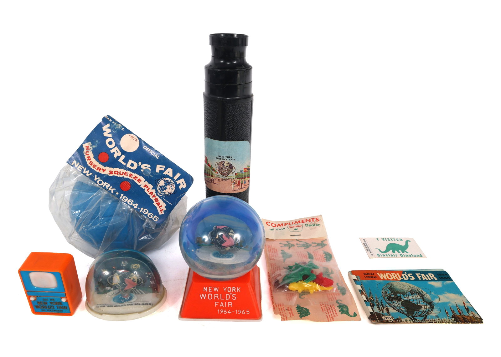 NEW YORK WORLD'S FAIR 1964 CHILDREN'S SOUVENIRS: NEW YORK WORLD'S FAIR 1964 CHILDREN'S SOUVENIRS 1964-65 New York World's Fair children's souvenirs: Sun Toy nursery squeeze playball, in original packaging (4" x 7") Miniature TV viewer