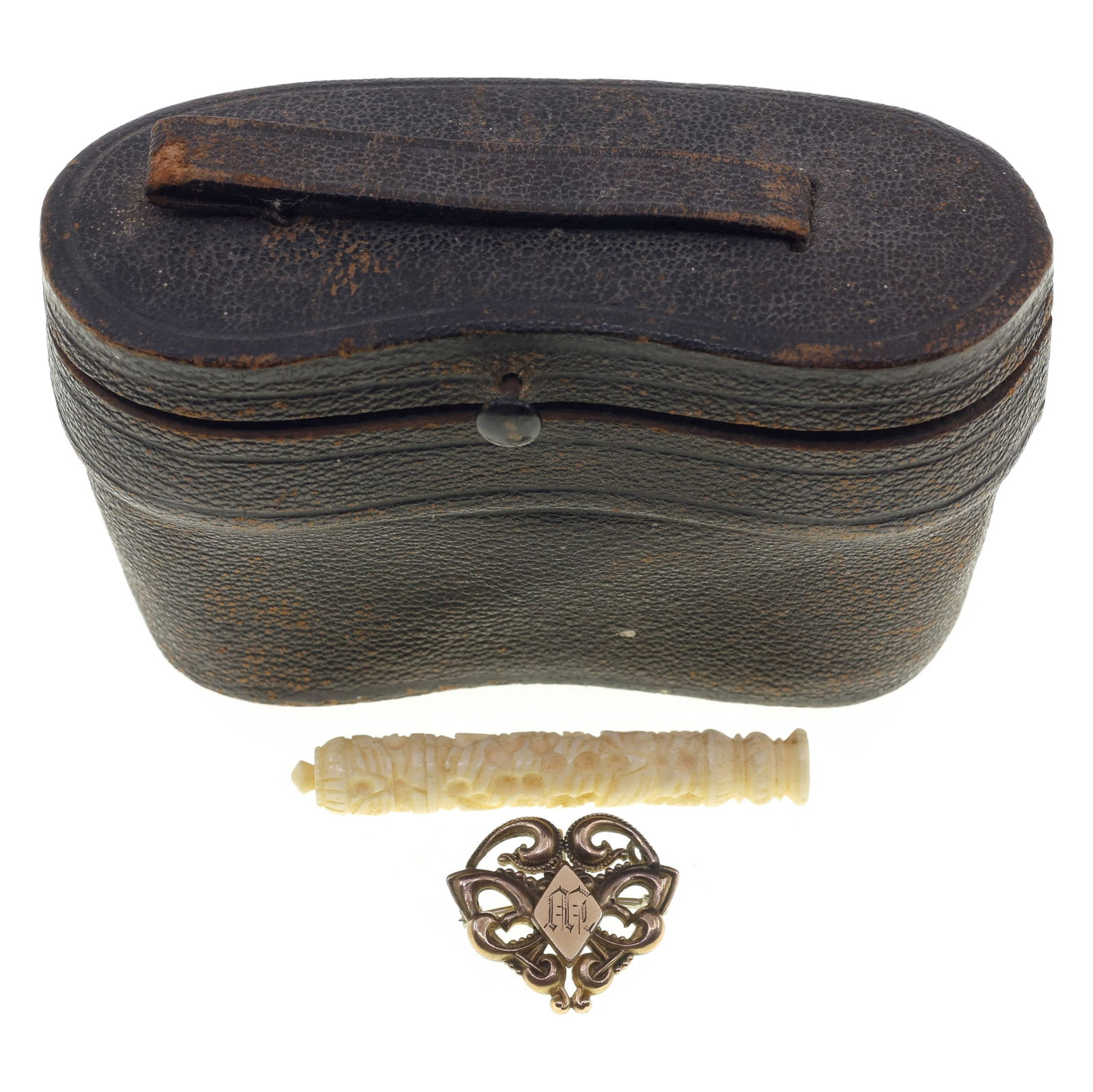 20TH C. OPERA GLASSES, BROOCH & NEEDLE CASE: 20TH C. OPERA GLASSES, BROOCH & NEEDLE CASE 20th Century women's accessories: Colomont Paris mother-of-pearl opera glasses, in leather case (4.25" x 2" x 2.5") Gold-filled ladies' pocket wat