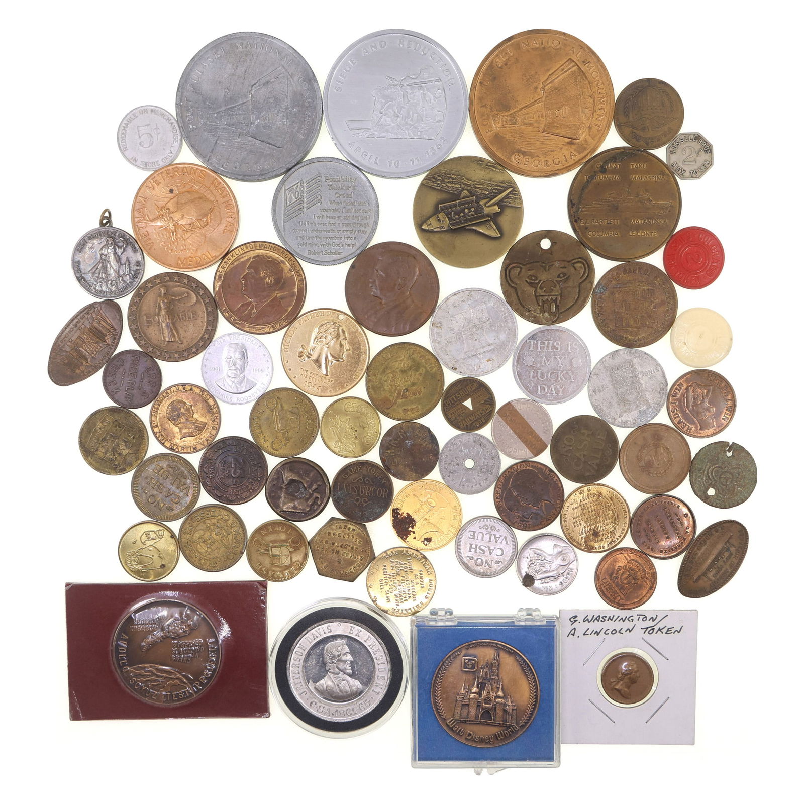 19TH & 20TH C. TRADE TOKENS & CHALLENGE COINS: 19TH & 20TH C. TRADE TOKENS & CHALLENGE COINS 19th and 20th-century trade tokens and challenge coins, some include: Challenge coins Walt Disney World Apollo Soyuz Test Project