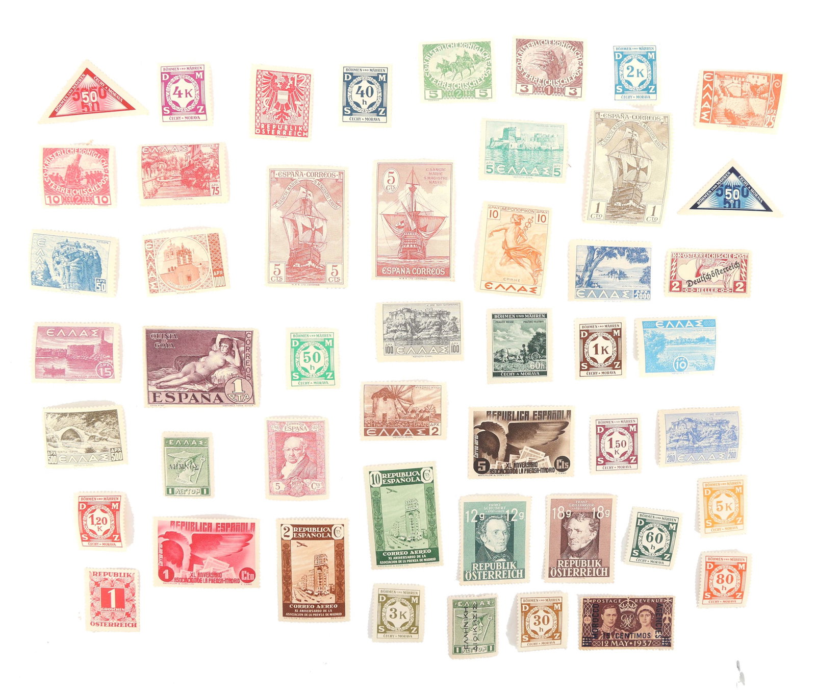 INTERNATIONAL POSTAGE STAMPS: INTERNATIONAL POSTAGE STAMPS Over 40 International Postage Stamps. All unused. Countries include Spain, Greece, Morocco, and more.