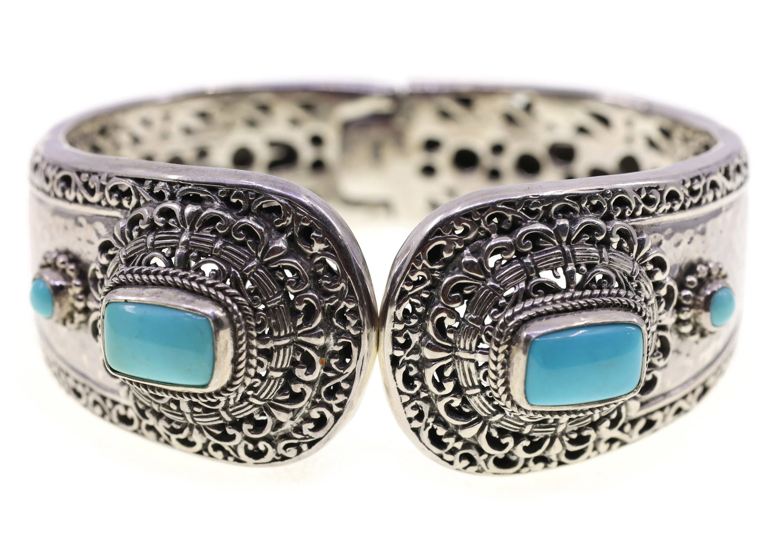STERLING SILVER SARDA TURQUOISE CUFF BRACELET: STERLING SILVER SARDA TURQUOISE CUFF BRACELET Sterling silver Sarda turquoise hinge cuff bracelet Size: 6.5" Weight: 61g