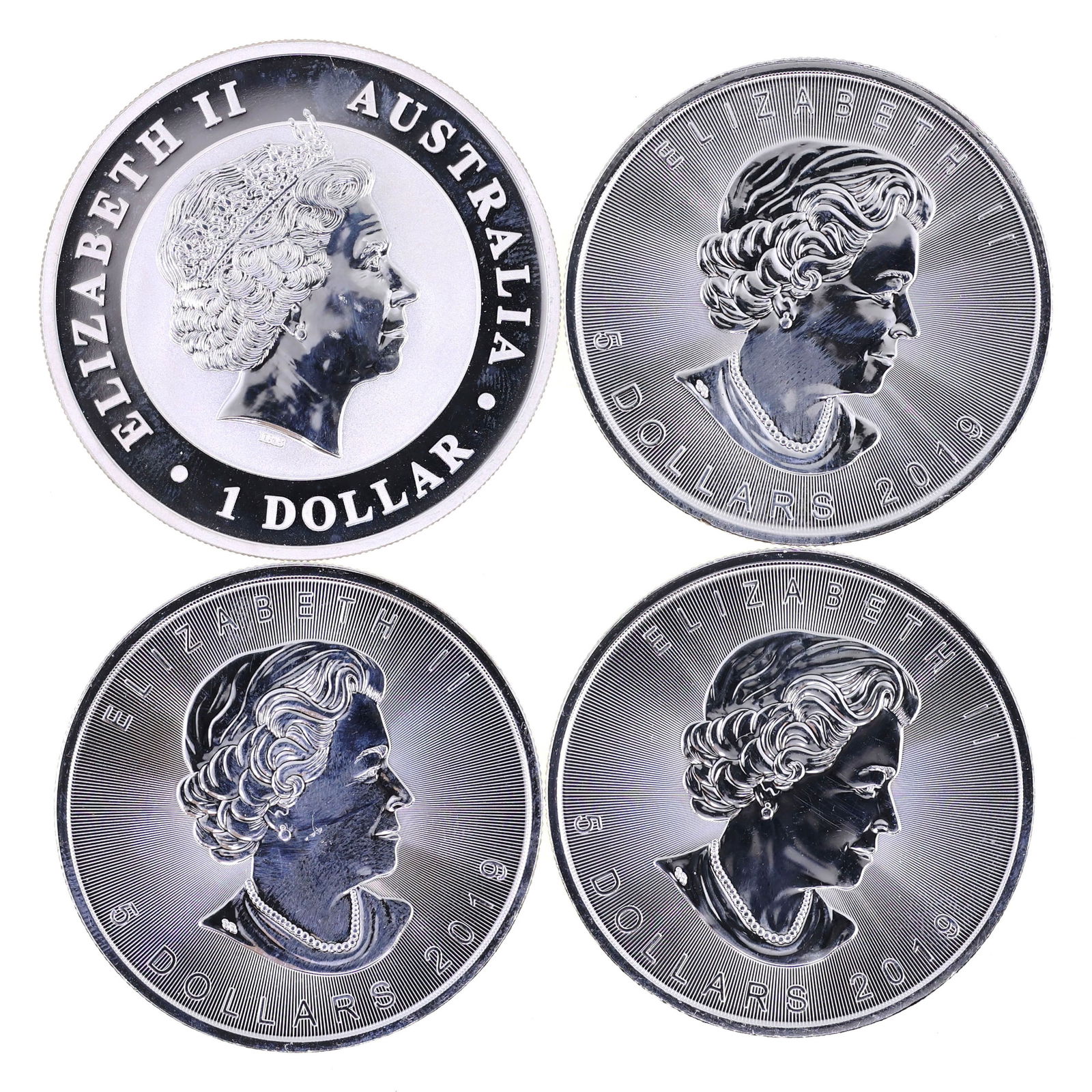 .999 SILVER 1 OZ CANADIAN & AUSTRALIAN COINS - LOT OF 4: IMPORTANT SHIPPING NOTE - PLEASE READ | LiveAuctioneers "LiveShipping" Is Unreasonable & Costly: LiveAuctioneers now requires all auctioneers to offer their "LiveShipping" service. Auctioneers no long