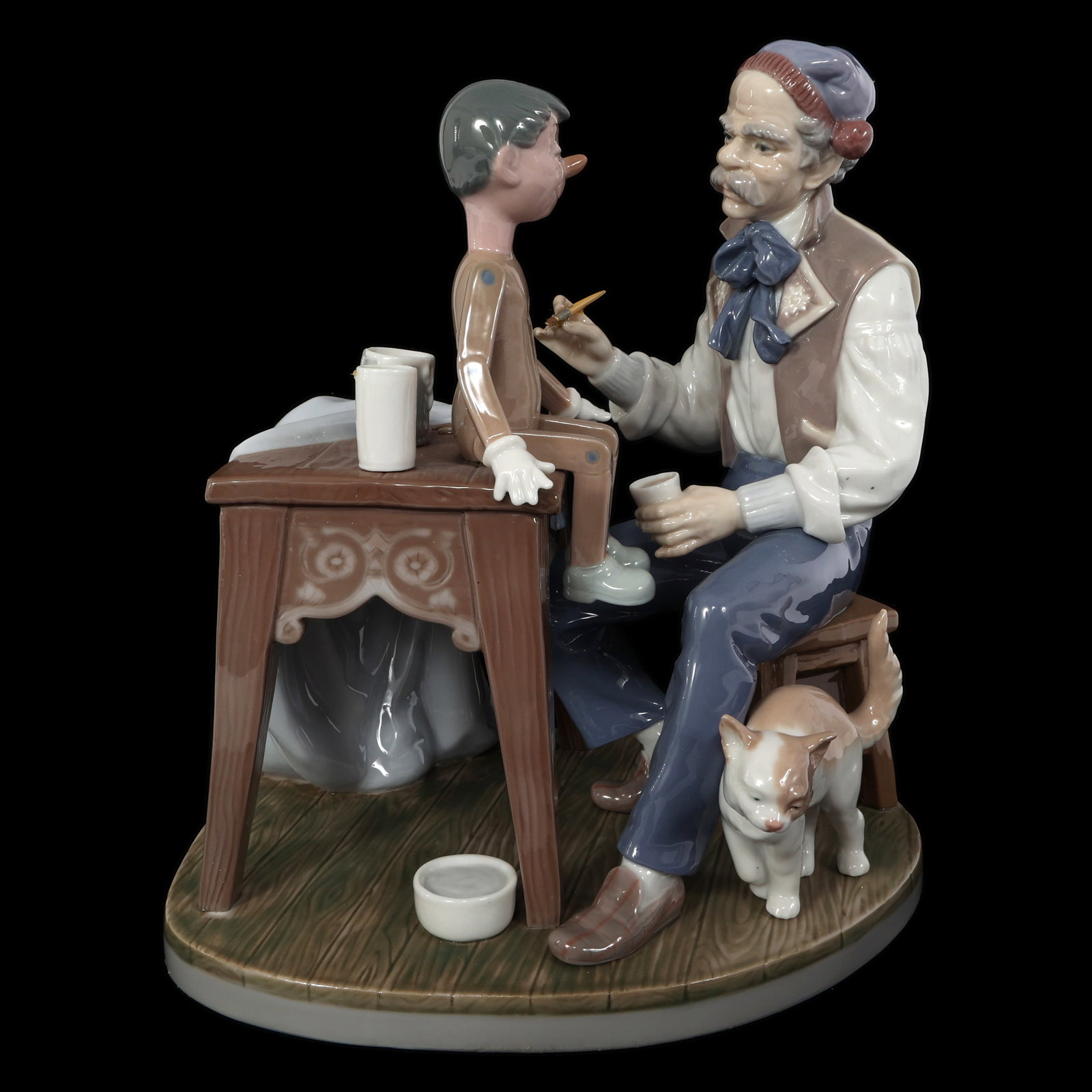 LLADRO PORCELAIN FIGURINE "THE PUPPET PAINTER" (1 of 9)