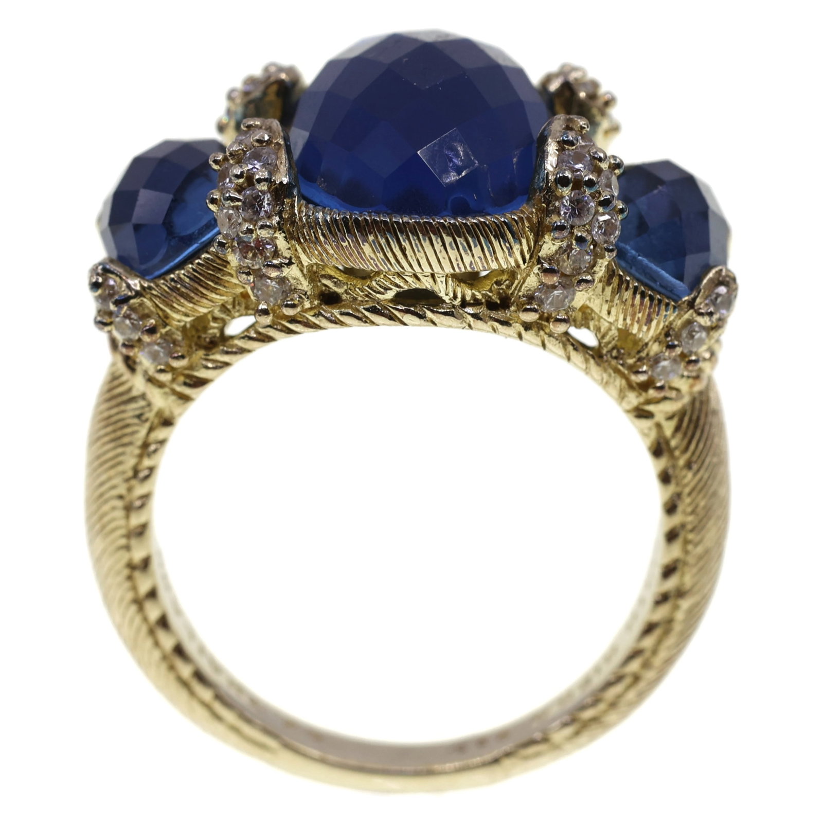 STERLING VERMEIL JUDITH RIPKA CUBIC ZIRCONIA RING: STERLING VERMEIL JUDITH RIPKA CUBIC ZIRCONIA RING Sterling silver vermeil Judith Ripka fashion ring with (3) Oval blue 14mm x 10mm, (2) 6.25mm x 8.35mm, and (40) round white (