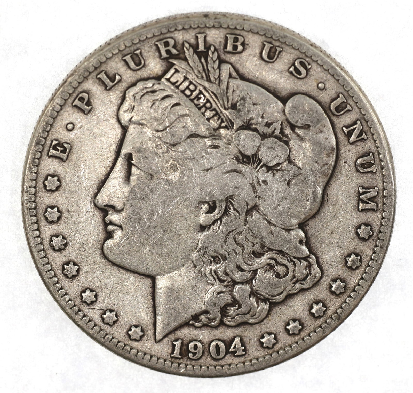 1904-S US SILVER MORGAN DOLLAR COIN - VG/F: 1904-S US SILVER MORGAN DOLLAR COIN - VG/F 1904-S United States .900 silver Morgan $1 coin, VG/F condition. IMPORTANT NOTE - PLEASE READ: OUR IN-HOUSE SHIPPING & INVOICING Shipping: LiveAuctione