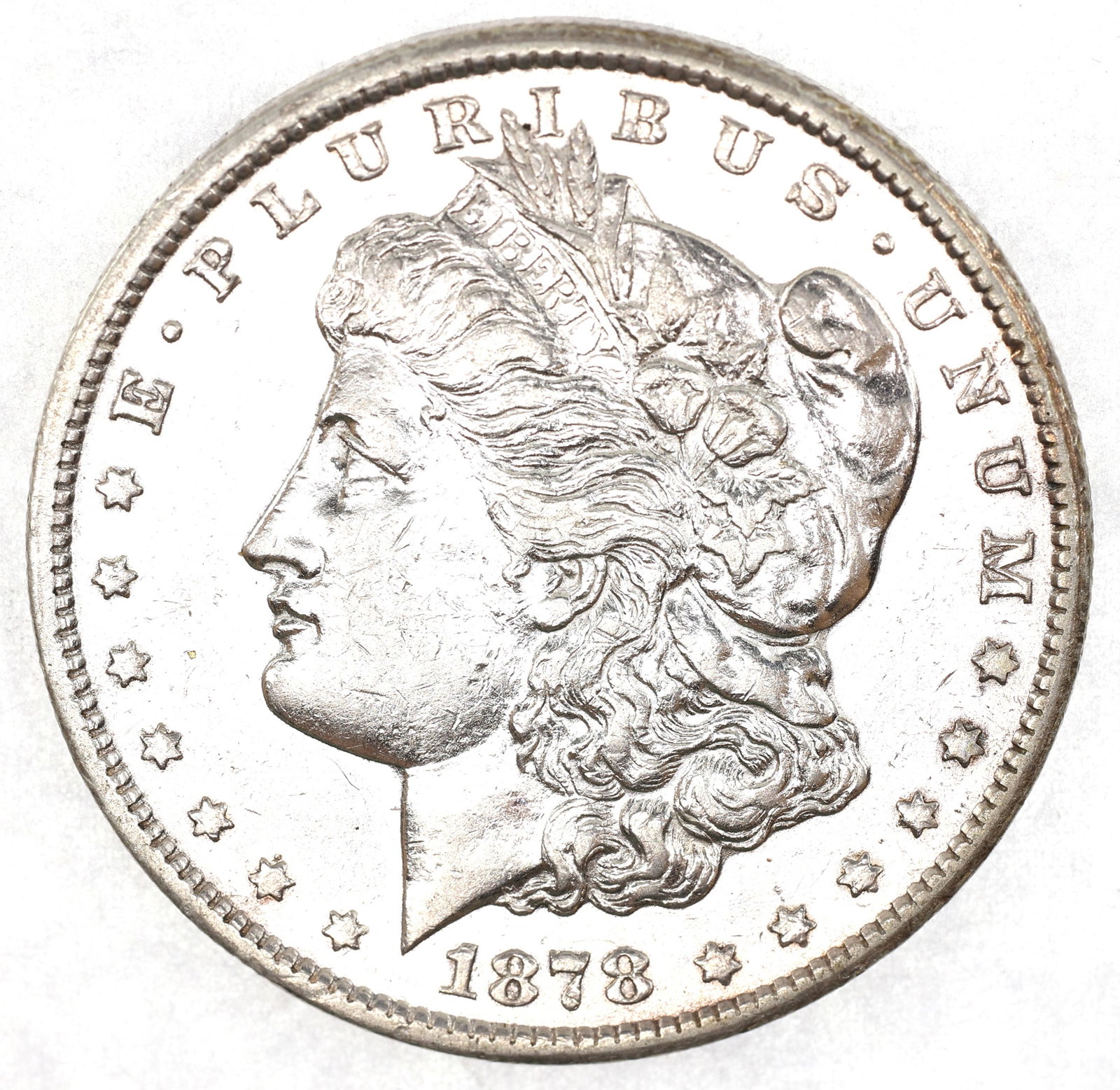1878-CC US SILVER MORGAN $1 COIN - XF CLEANED: 1878-CC US SILVER MORGAN $1 COIN - XF CLEANED 1878-CC United States .900 silver Morgan Dollar coin, XF cleaned condition. IMPORTANT NOTE - PLEASE READ: OUR IN-HOUSE SHIPPING & INVOICING Shipping