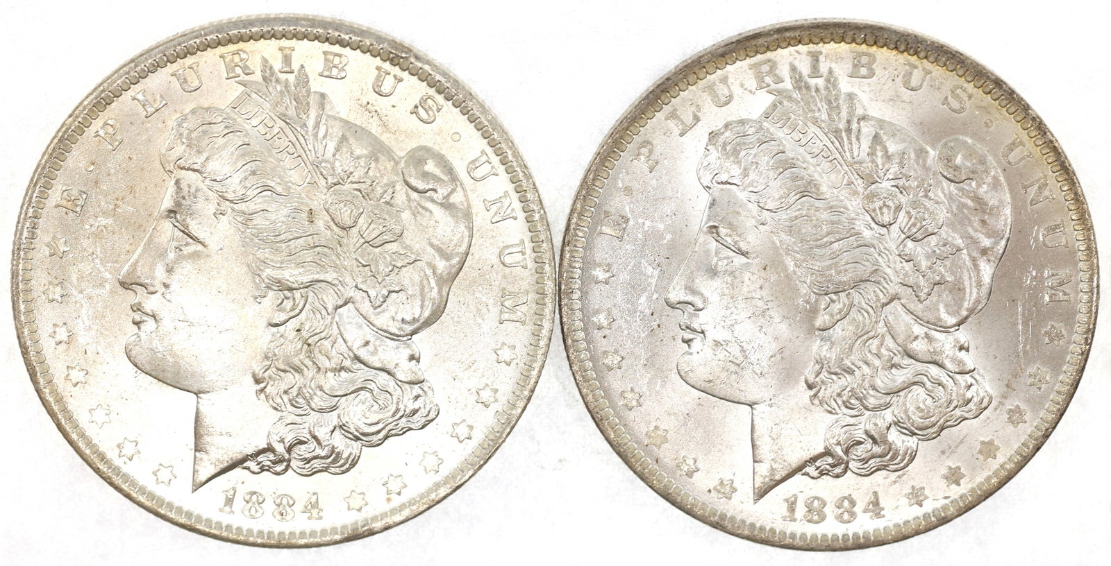 1884-O US SILVER MORGAN $1 AU/MS COINS - LOT OF 2 (1 of 4)