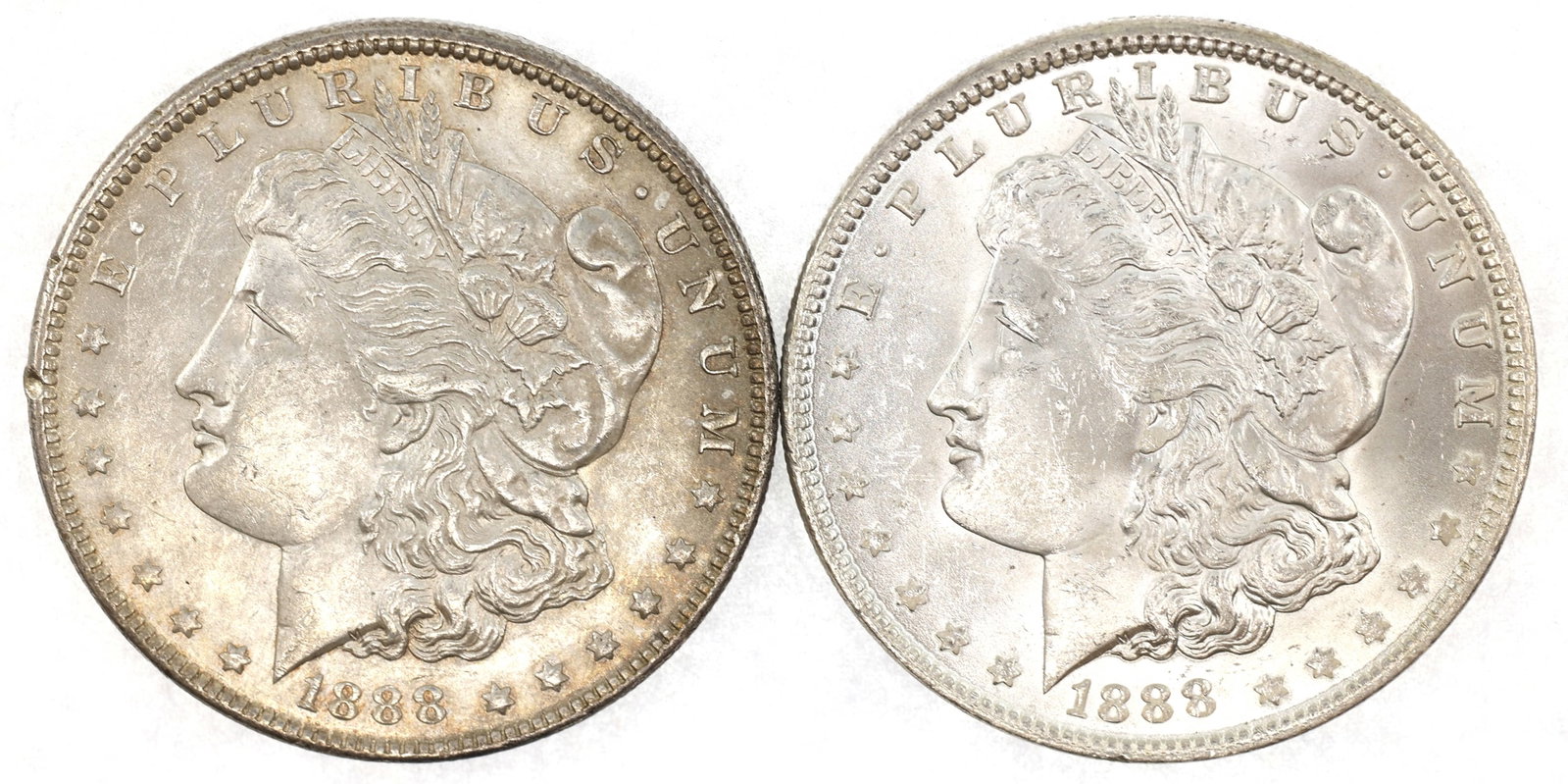1888 US SILVER MORGAN $1 XF/AU COINS - LOT OF 2: 1888 US SILVER MORGAN $1 XF/AU COINS - LOT OF 2 Two 1888-P United States .900 silver Morgan Dollar coins, XF to AU condition. IMPORTANT NOTE - PLEASE READ: OUR IN-HOUSE SHIPPING & INVOICING Ship