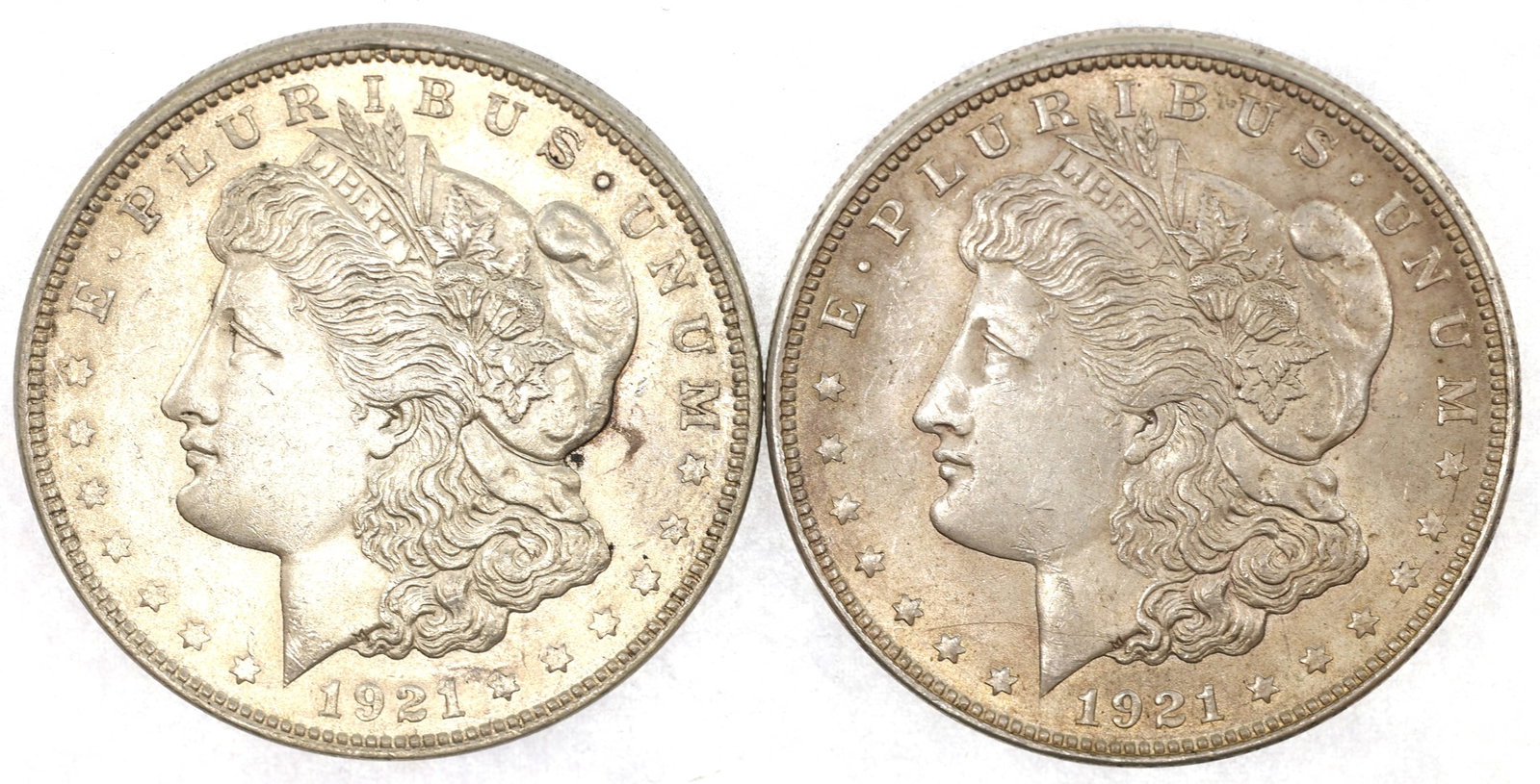 1921-P US SILVER MORGAN DOLLAR XF/AU COINS: 1921-P US SILVER MORGAN DOLLAR XF/AU COINS Two 1921-P United States .900 silver Morgan $1 coins, XF to AU condition. IMPORTANT NOTE - PLEASE READ: OUR IN-HOUSE SHIPPING & INVOICING Shipping: Liv