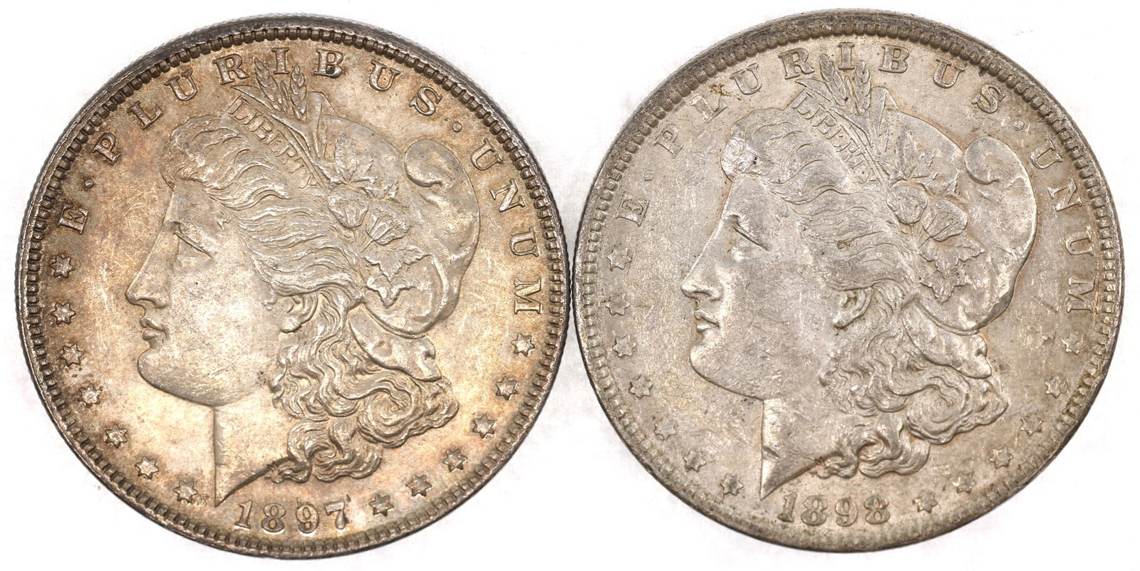 US SILVER MORGAN DOLLAR XF COINS - LOT OF 2: US SILVER MORGAN DOLLAR XF COINS - LOT OF 2 Two United States .900 silver Morgan $1 coins, both XF condition. Includes one 1897-P and one 1898-P. IMPORTANT NOTE - PLEASE READ: OUR IN-HOUSE SHIPP