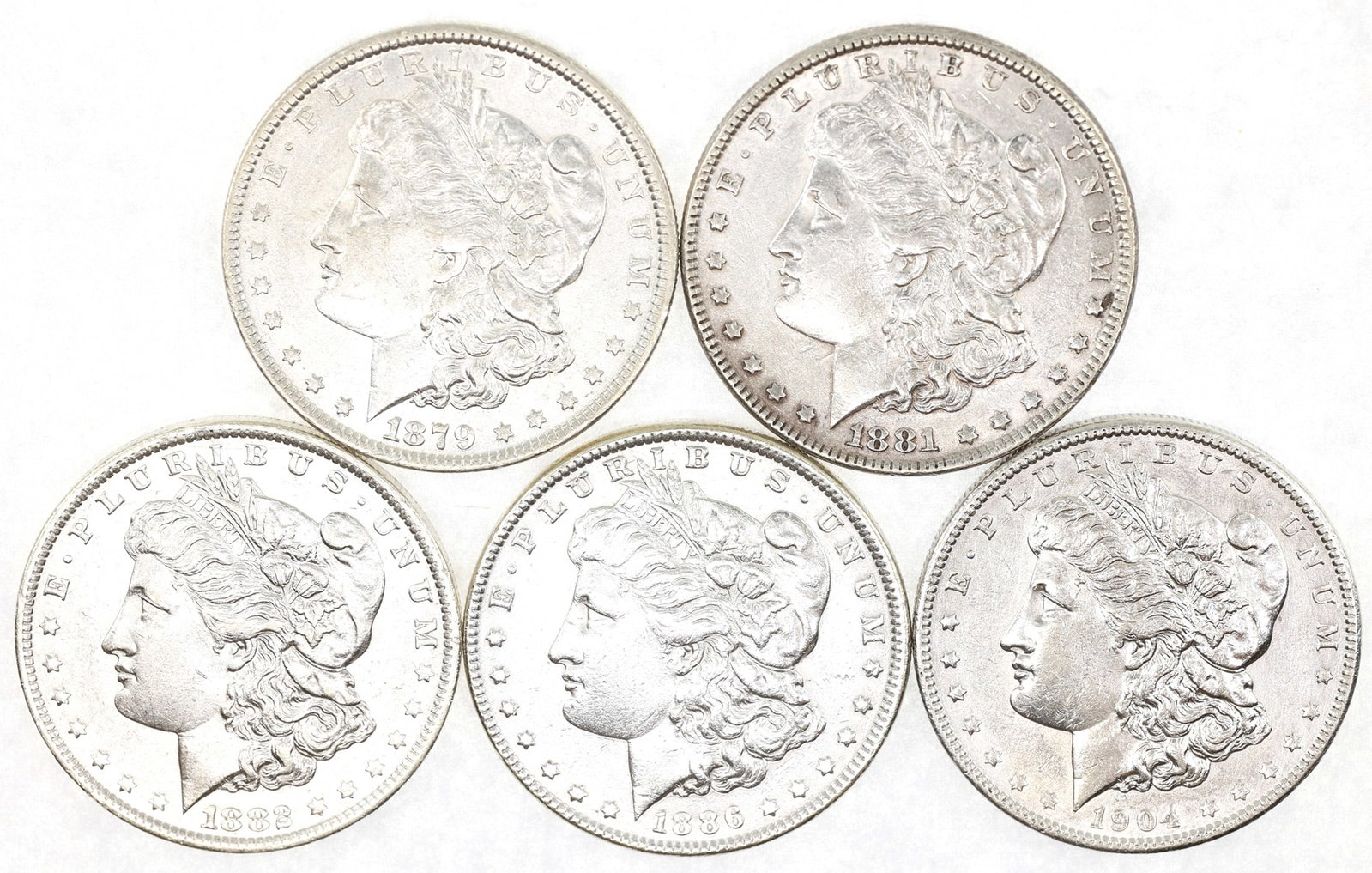 US SILVER MORGAN DOLLAR XF COINS - LOT OF 5: US SILVER MORGAN DOLLAR XF COINS - LOT OF 5 United States .900 silver Morgan $1 coins, all XF condition: 1879-P 1881-P 1882-O 1886-P 1904-P IMP