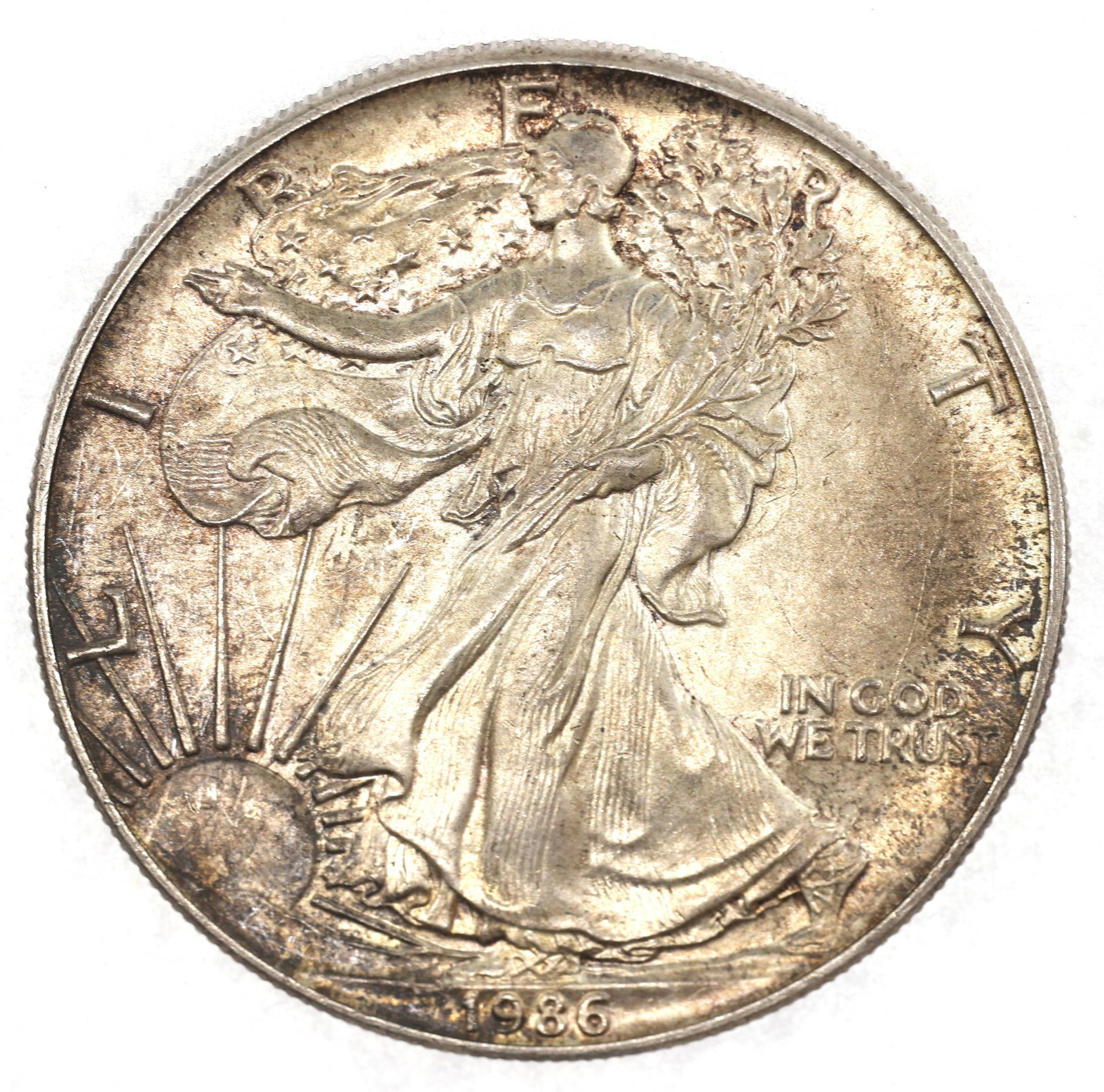 1986 US .999 SILVER EAGLE $1 COIN: 1986 US .999 SILVER EAGLE $1 COIN 1986 United States .999 silver Eagle $1 coin. IMPORTANT NOTE - PLEASE READ: OUR IN-HOUSE SHIPPING & INVOICING Shipping: LiveAuctioneers "LiveShipping" Is Unreas
