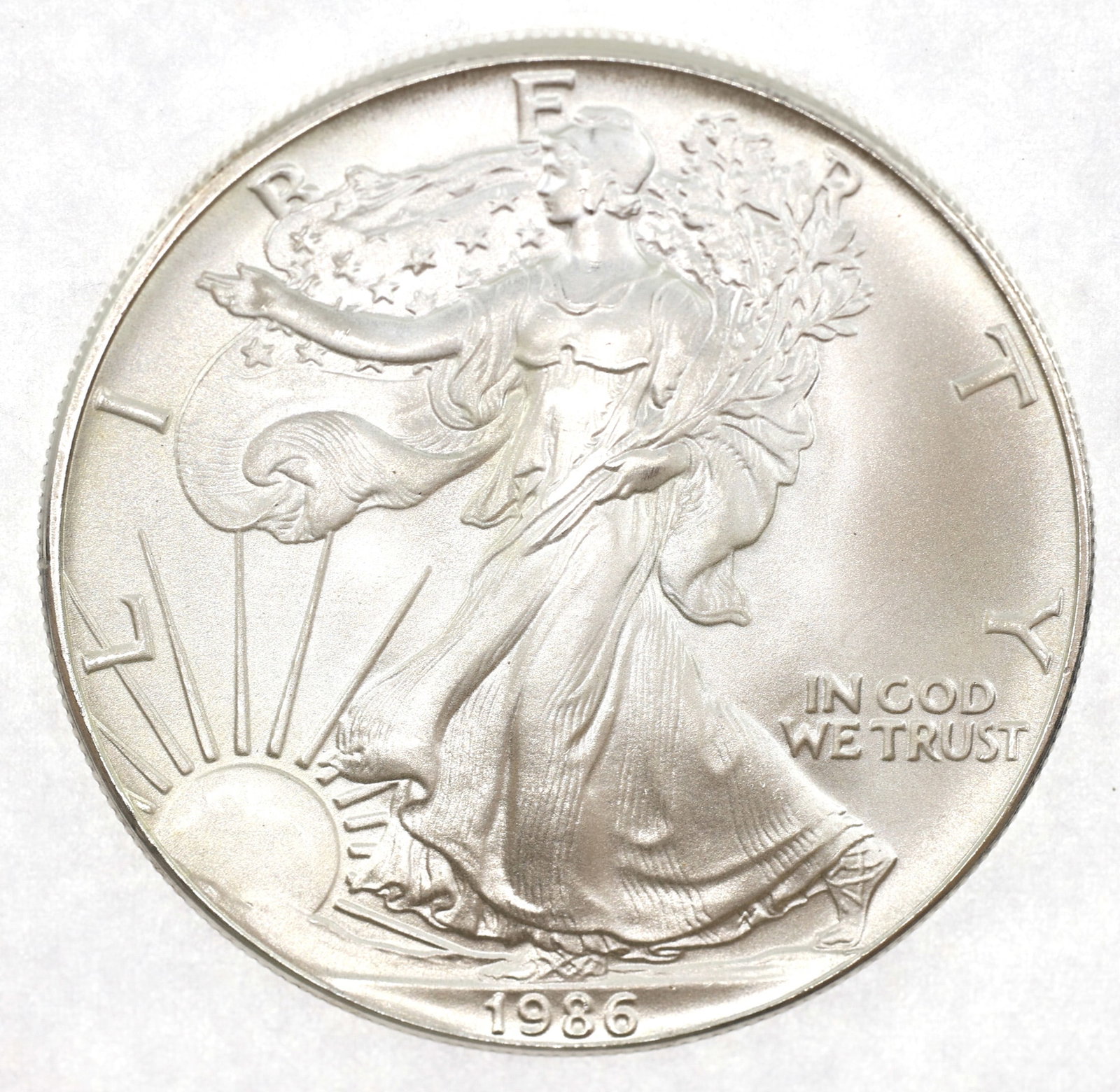 1986 US .999 SILVER EAGLE $1 COIN - UNC (1 of 2)
