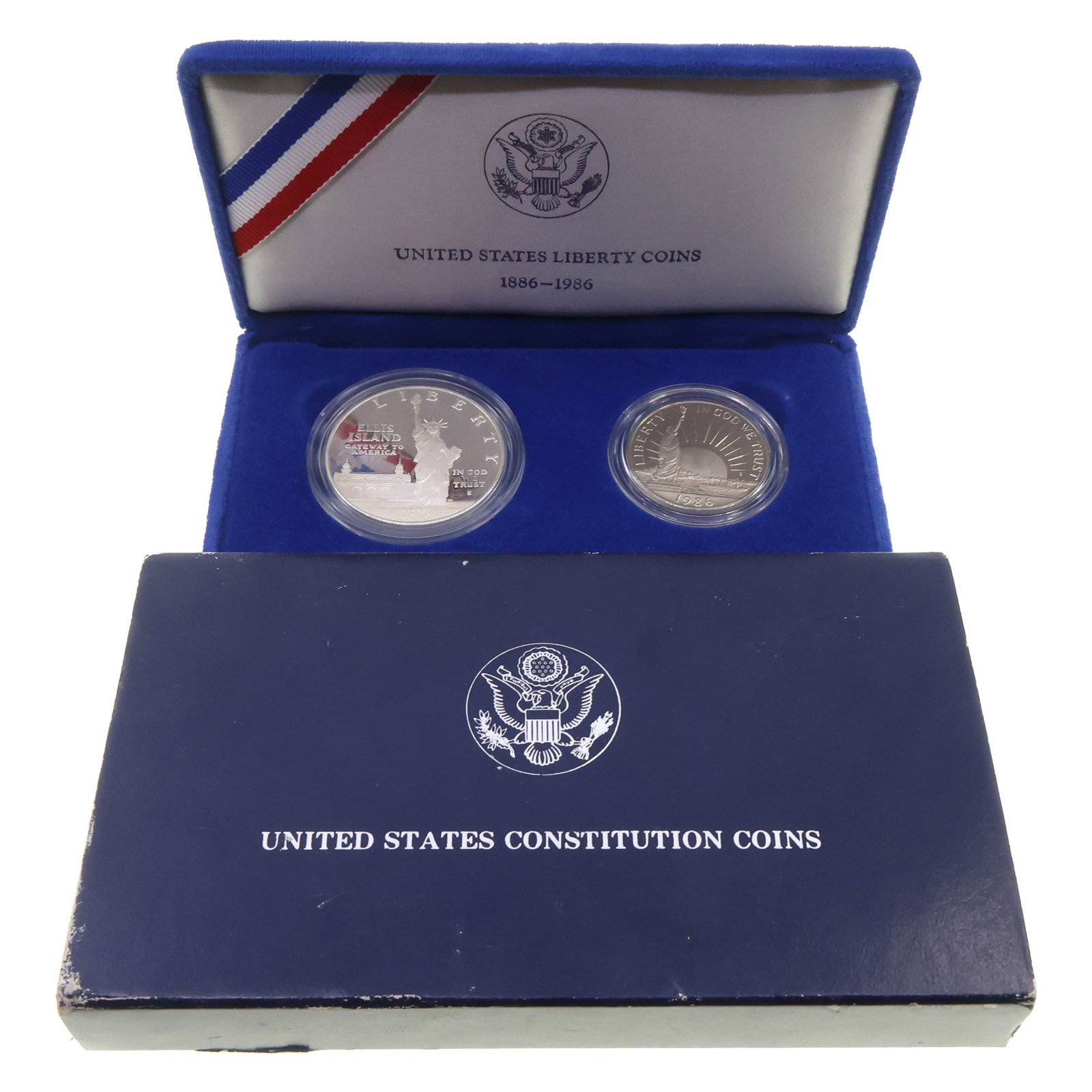 1986 & 1987 US CONSTITUTION & LIBERTY COMMEM. COINS: 1986 & 1987 US CONSTITUTION & LIBERTY COMMEM. COINS United States commemorative coins: 1986 Ellis Island .900 silver $1 coin Ellis Island clad 50c coin 1987<