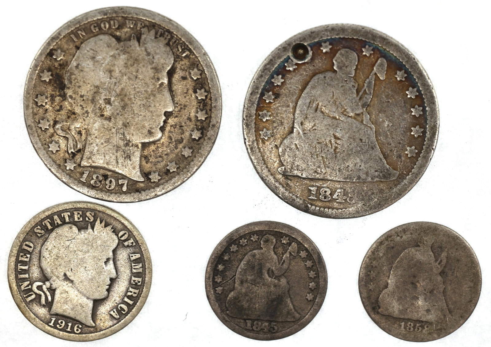 US SILVER SEATED & BARBER TYPE COIN EXPLORER LOT: US SILVER SEATED & BARBER TYPE COIN EXPLORER LOT United States .900 silver coin explorer lot: Seated Liberty 1845 25c 1845 5c (half dime) 1858 5c (half dime)