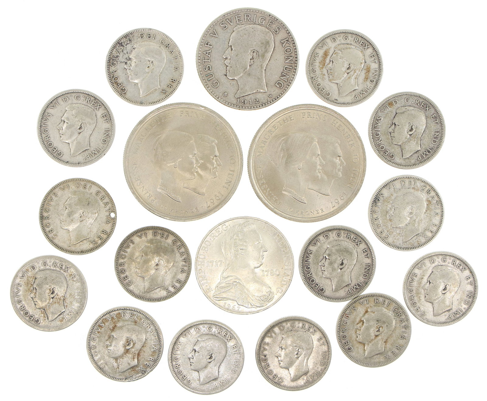 FOREIGN .800 SILVER COINS: FOREIGN .800 SILVER COINS Foreign mixed denomination coins, .800 silver composition. Weight: 148g IMPORTANT NOTE - PLEASE READ: OUR IN-HOUSE SHIPPING & INVOICING Shipping: LiveAuctioneers "LiveS