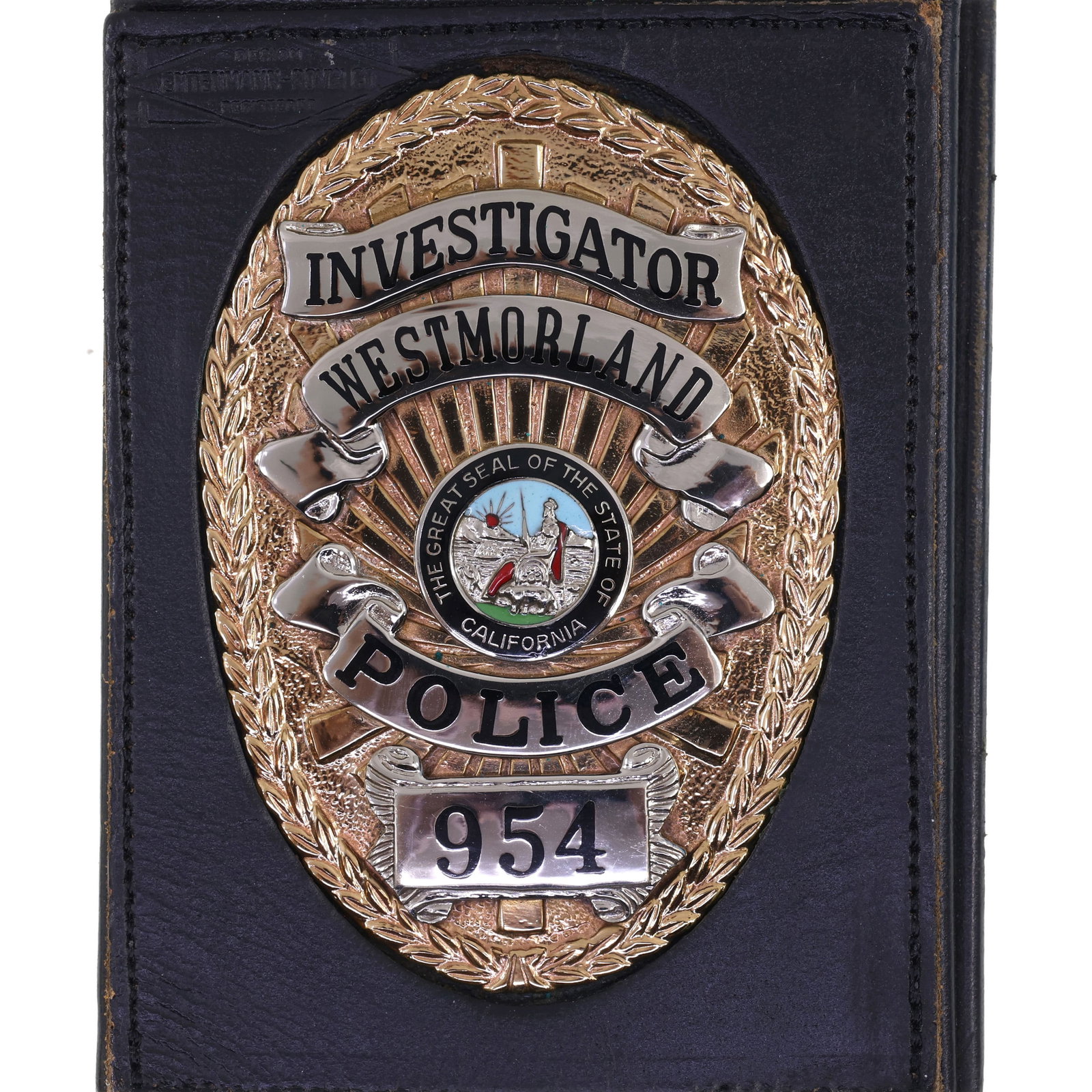 OBSOLETE WESTMORLAND CA POLICE INVESTIGATOR BADGE #954 (1 of 3)
