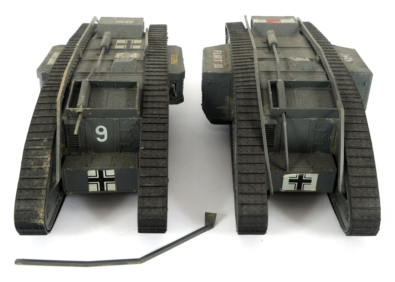 WWI BRITISH MODEL MK 4 TANK MODELS: WWI BRITISH MODEL MK 4 TANK MODELS Two WWI British MK 4 Tank Models. Size: 8.5"x3.5" IMPORTANT NOTE - PLEASE READ: OUR IN-HOUSE SHIPPING & INVOICING Shipping: LiveAuctioneers "LiveShipping" Is Unreaso