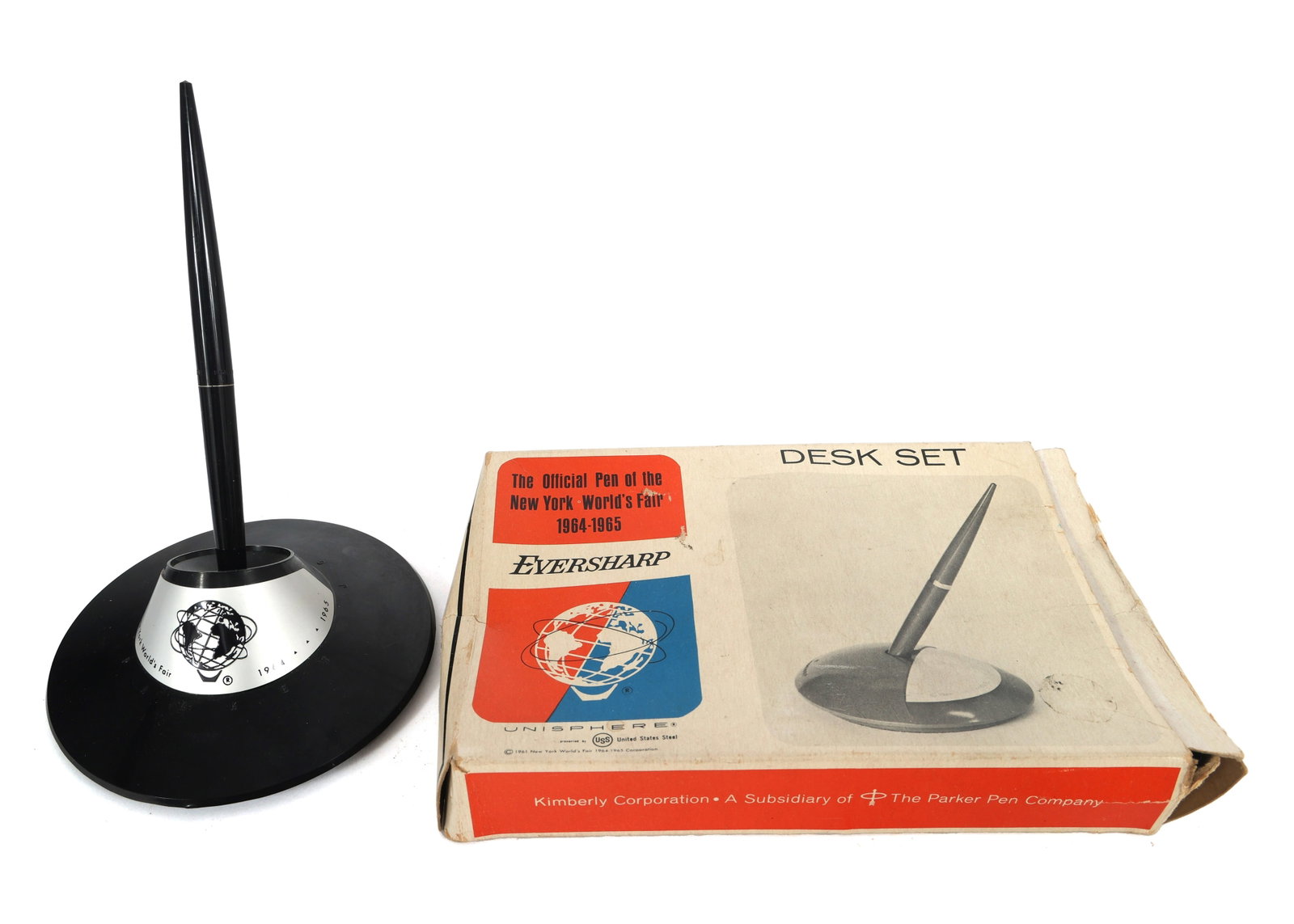 NEW YORK WORLD'S FAIR 1964 BALLPOINT PEN DESK SETS: NEW YORK WORLD'S FAIR 1964 BALLPOINT PEN DESK SETS 1964-65 New York World's Fair ballpoint pen desk sets Eversharp brand, in original box. Holder (3.75") Pen (6.5") </