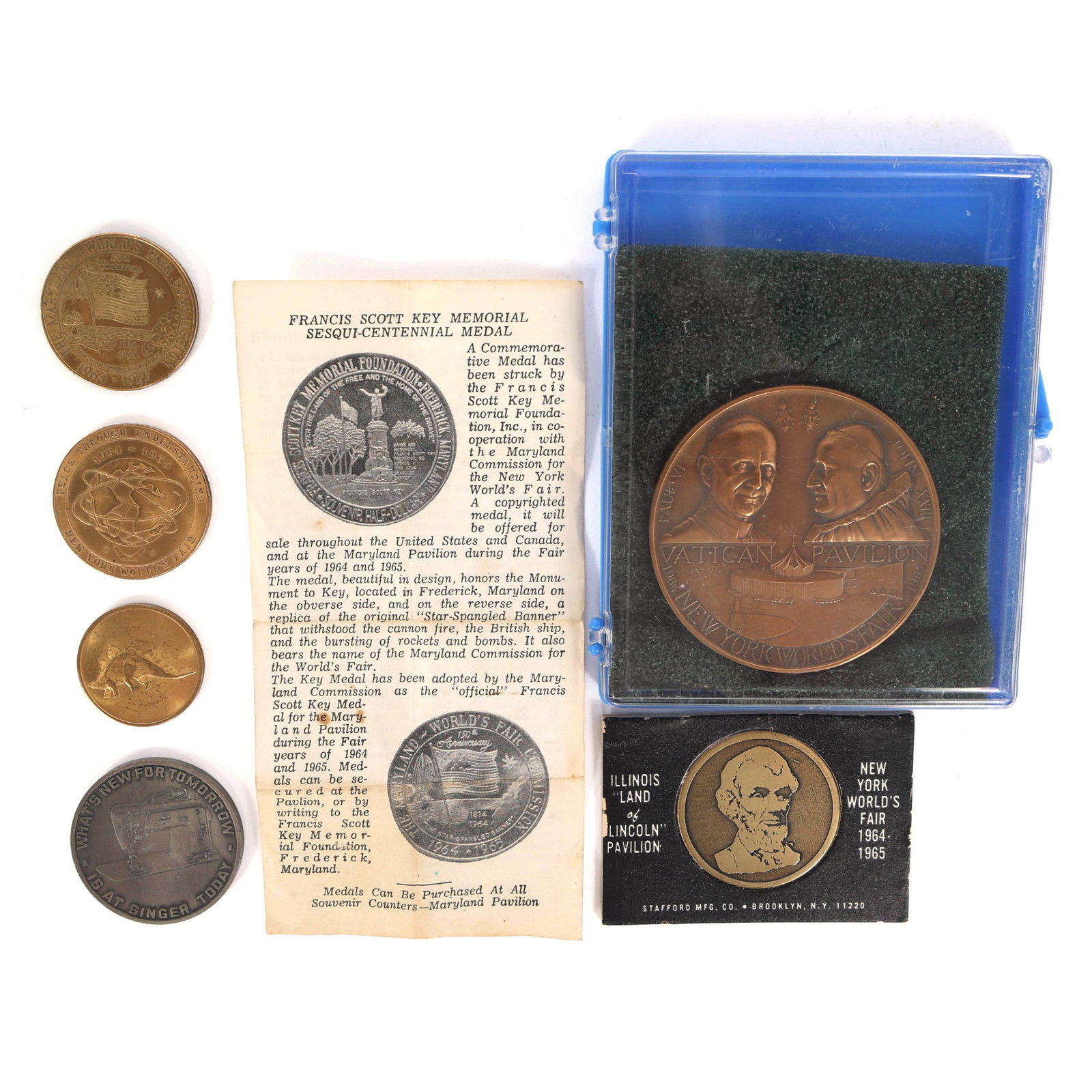 NEW YORK WORLD'S FAIR 1964 PAVILION COIN SOUVENIRS (1 of 7)