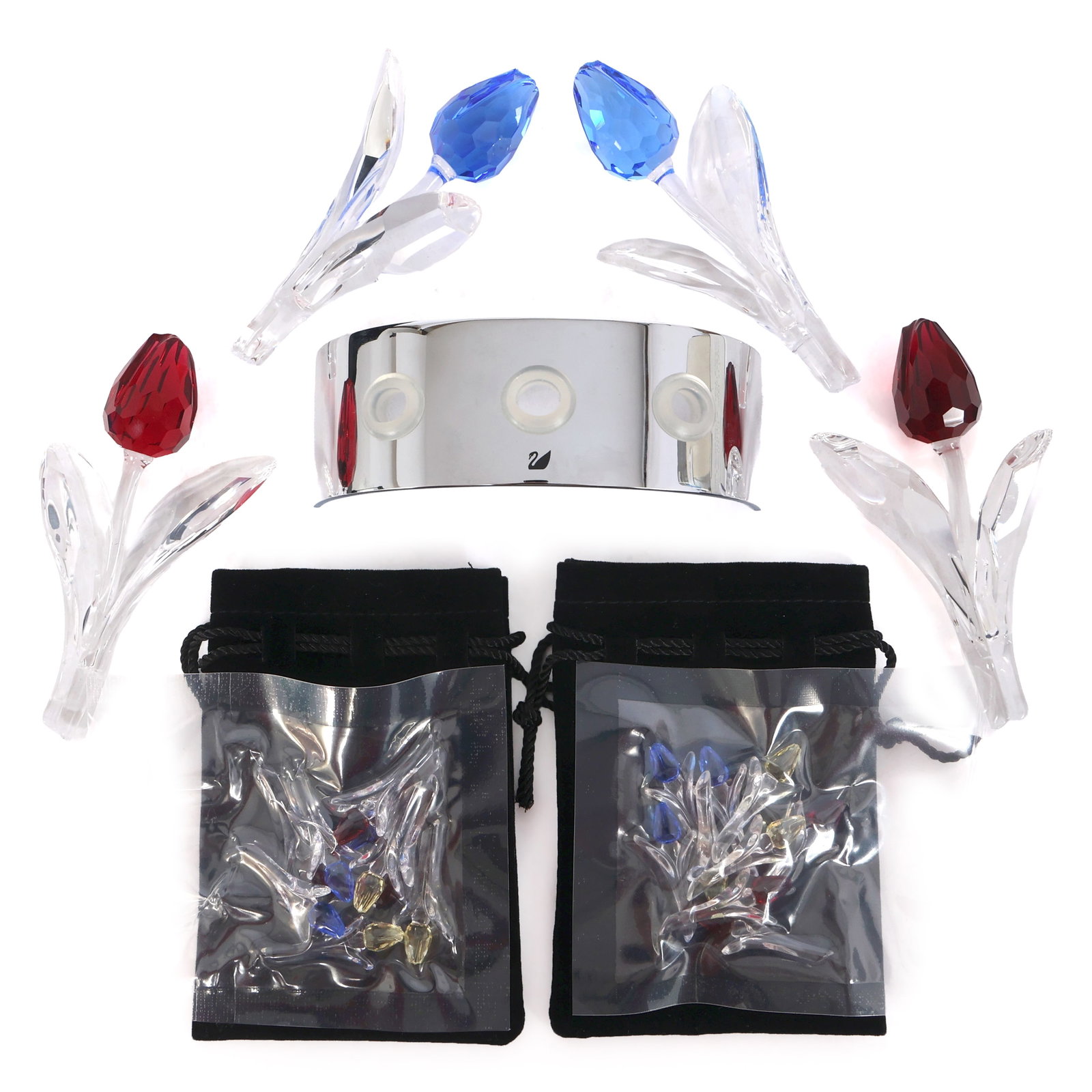 SWAROVSKI CRYSTAL TULIPS & DISPLAY: SWAROVSKI CRYSTAL TULIPS & DISPLAY Swarovski Crystal Large and Small Tulips & Display. Includes: 3 Tulip display (2) Large blue tulips (2) Large red tulips, each with 9 sma