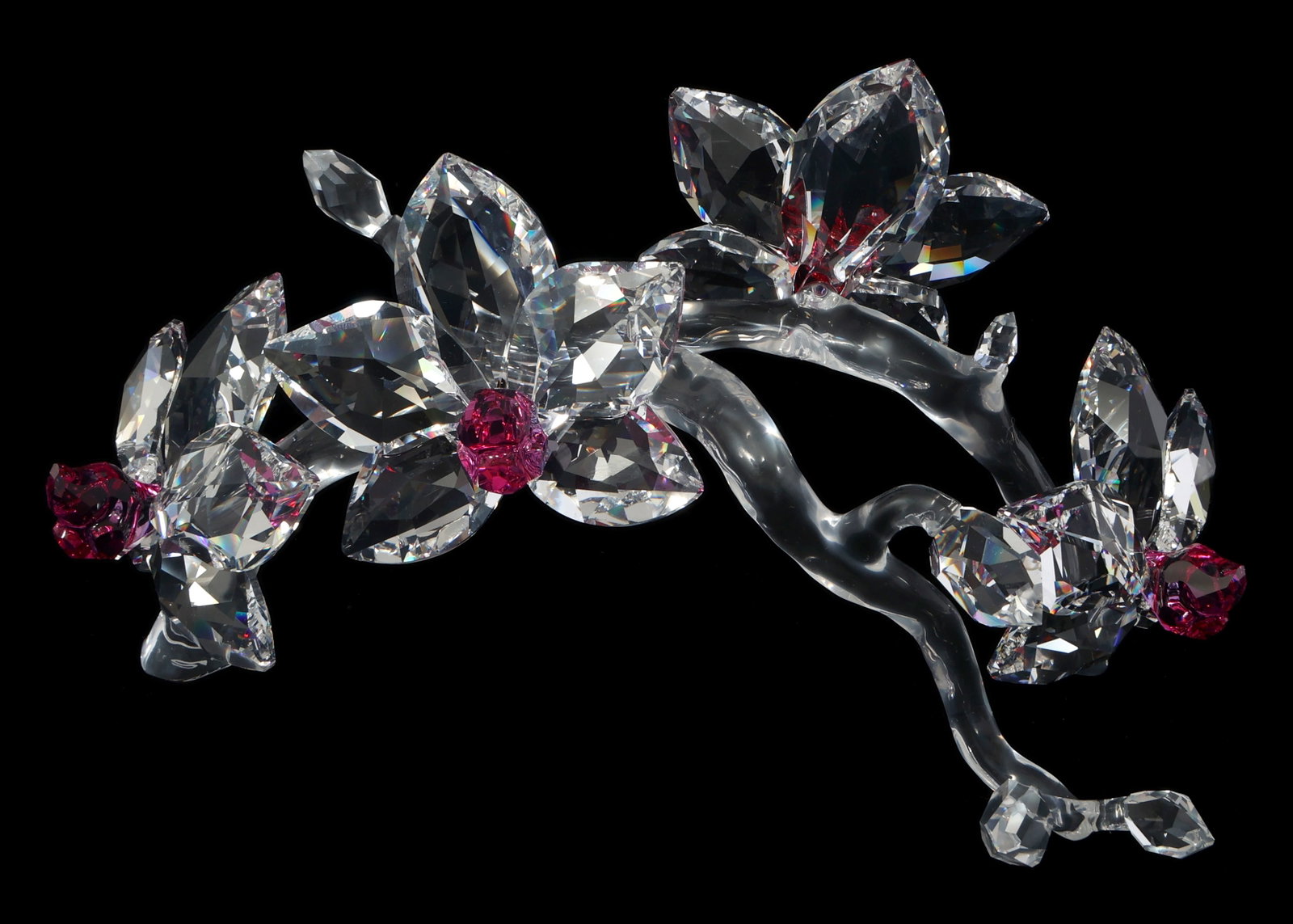 SWAROVSKI CRYSTAL FIGURINE "ORCHID ON A VINE": SWAROVSKI CRYSTAL FIGURINE "ORCHID ON A VINE" Swarovski Crystal Figurine. "Orchid on a Vine" #864443 Includes original box. Size: 7.5" IMPORTANT NOTE - PLEASE READ: RE
