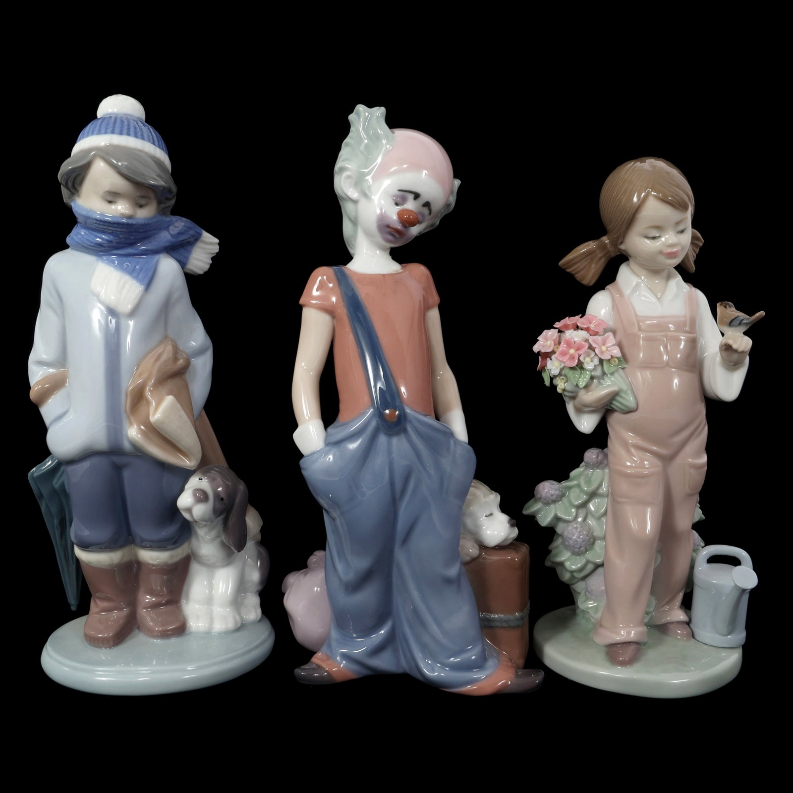 LLADRO PORCELAIN SMALL FIGURINES - LOT OF 3: LLADRO PORCELAIN SMALL FIGURINES - LOT OF 3 Lladro Porcelain Figurines. Includes: #05217 Spring #06245 Destination Big Top #05220 Winter Includes original