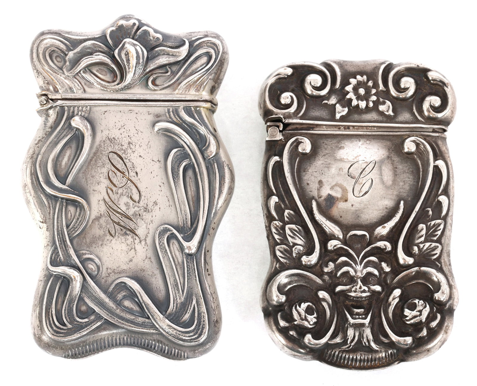 STERLING SILVER DECORATIVE VESTA MATCH CASES: STERLING SILVER DECORATIVE VESTA MATCH CASES Sterling silver vesta match cases: Art Nouveau floral pattern 1.5 x 2.75" Satyr's head with acanthus pattern 1.5 x 2.5" Weight: 48g IMPORTANT NOTE -