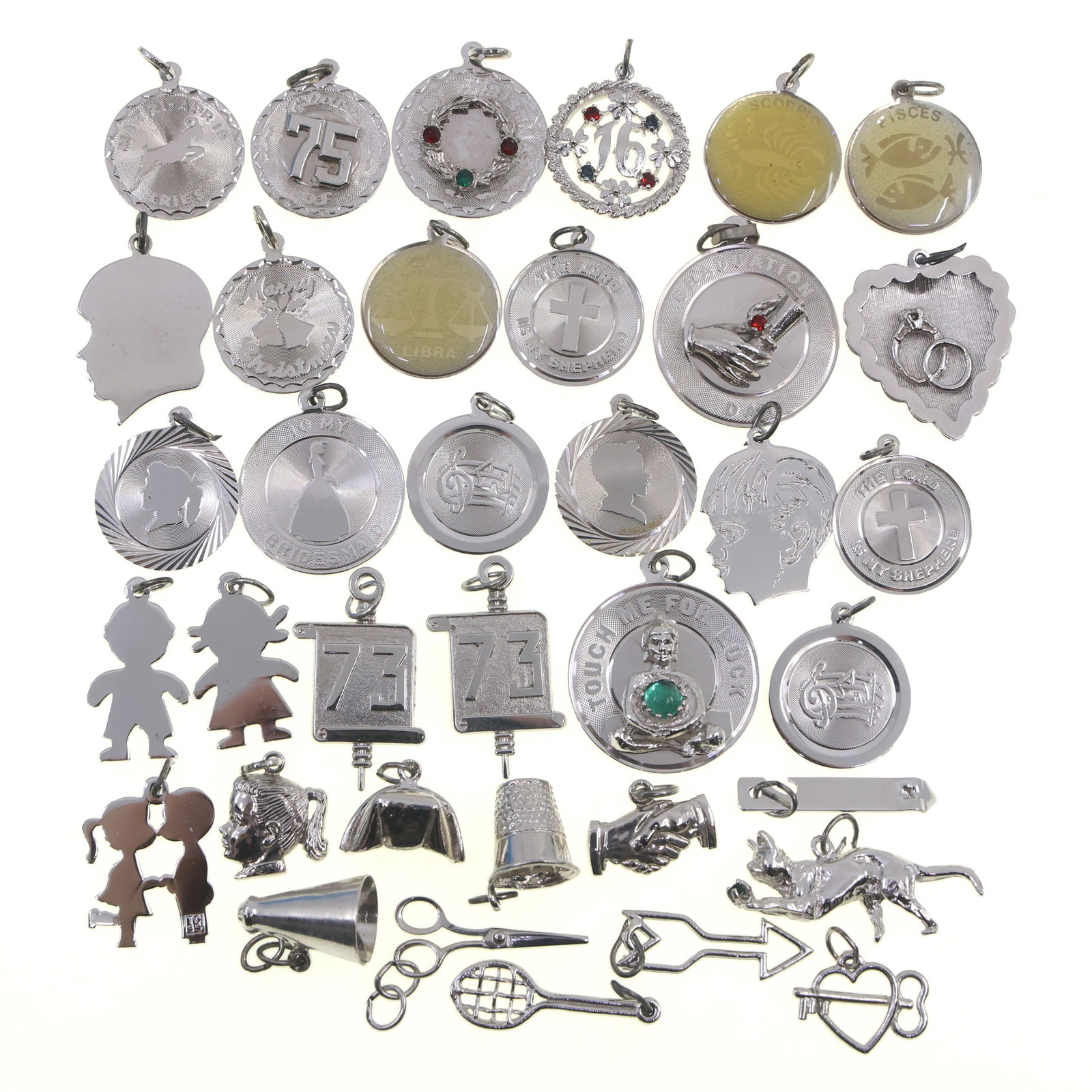 STERLING SILVER NOVELTY CHARMS: STERLING SILVER NOVELTY CHARMS Sterling silver novelty charms, themes include: Zodiac/astrology Sports Sewing Celebratory Religious 1973 graduation <