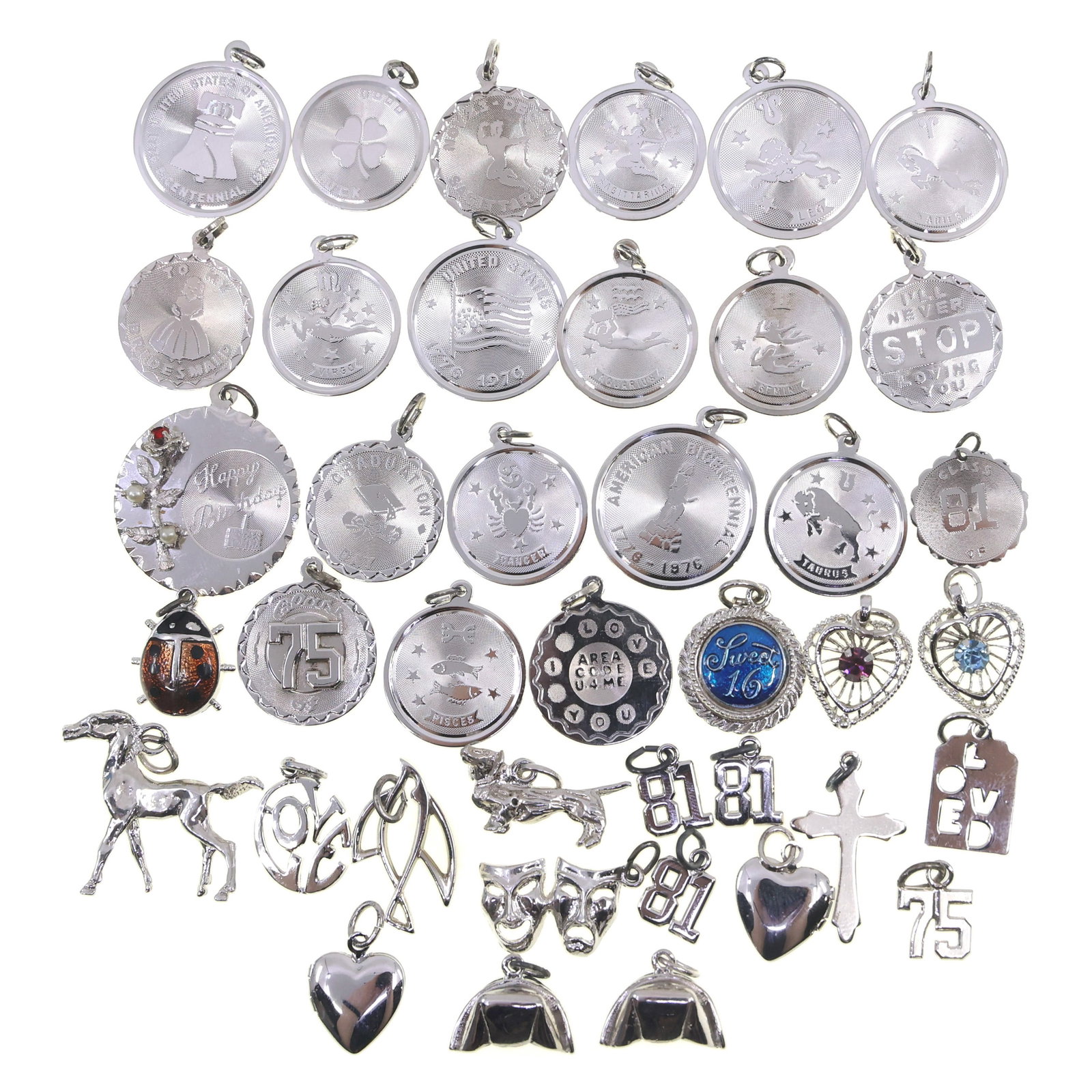 STERLING SILVER NOVELTY CHARMS: STERLING SILVER NOVELTY CHARMS Sterling silver novelty charms, themes include: Zodiac/astrology US history Celebratory Animals Religious Graduation <