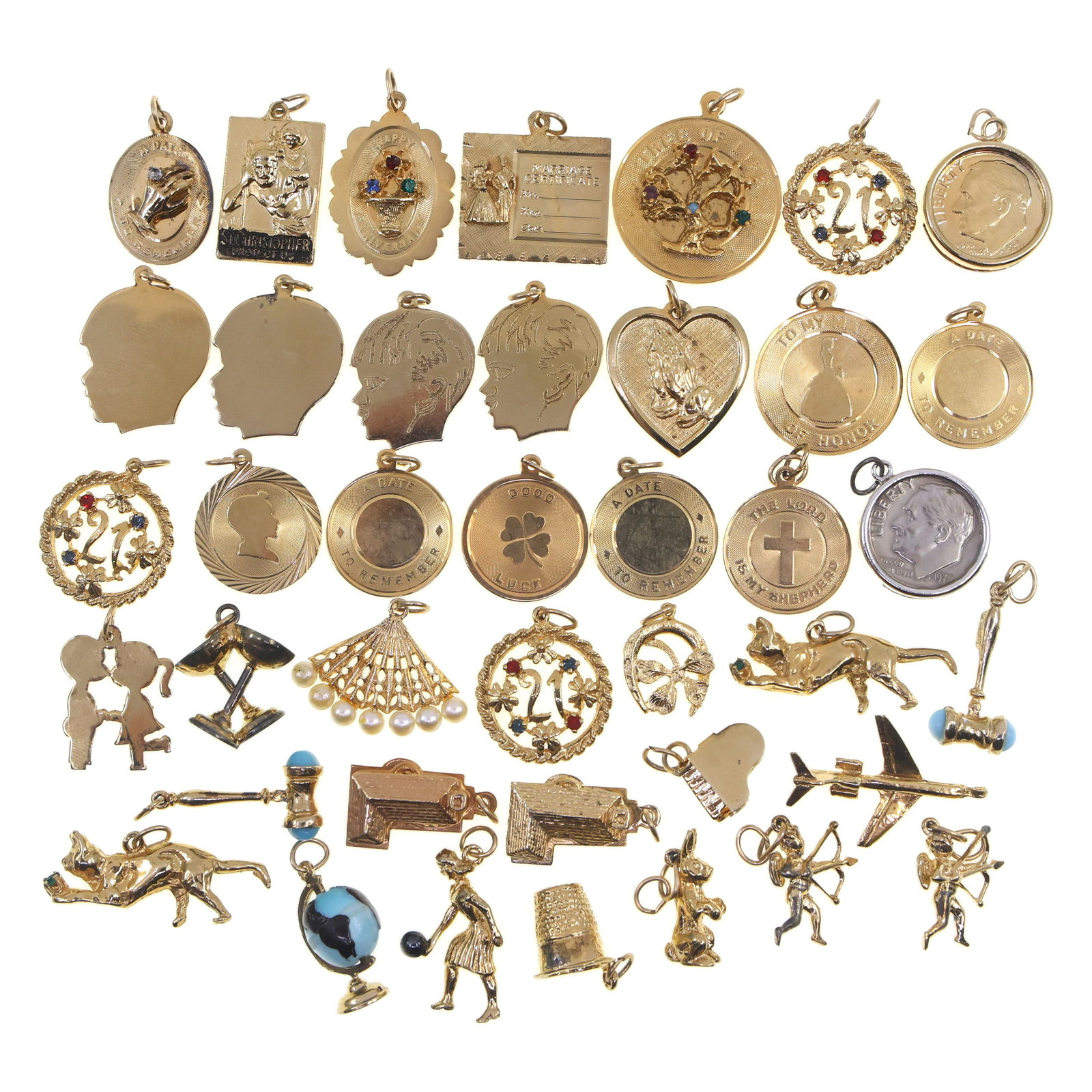 STERLING SILVER VERMEIL NOVELTY CHARMS: STERLING SILVER VERMEIL NOVELTY CHARMS Sterling silver vermeil novelty charms, themes include: Zodiac/astrology Sewing Musical instruments Celebratory Religious <
