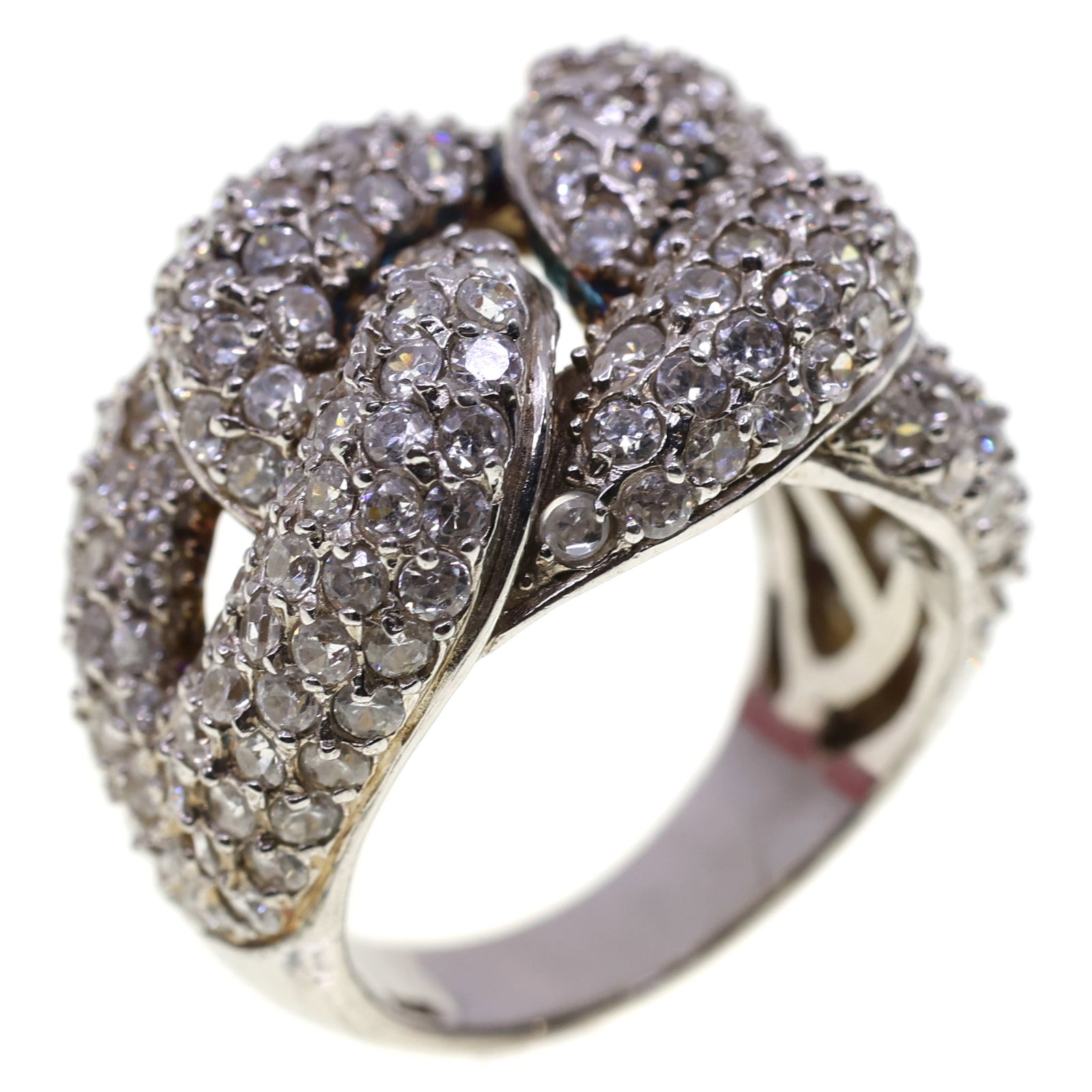STERLING SILVER CUBIC ZIRCONA CLUSTER KNOT FASHION RING: STERLING SILVER CUBIC ZIRCONA CLUSTER KNOT FASHION RING Sterling silver cubic zirconia cluster knot fashion ring Size: 7.75 Weight: 11g IMPORTANT NOTE - PLEASE READ: REGARDING OUR IN-HOUSE SHIPPING &