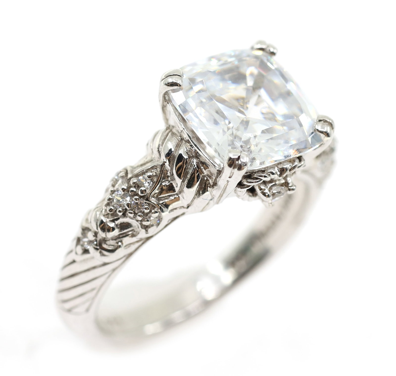 STERLING SILVER JUDITH RIPKA CZ COCKTAIL RING: STERLING SILVER JUDITH RIPKA CZ COCKTAIL RING Sterling silver Judith Ripka cubic zirconia cocktail ring. The center CZ is 10 x 10mm. Size: 8 Weight: 7g IMPORTANT NOTE - PLEASE READ:
