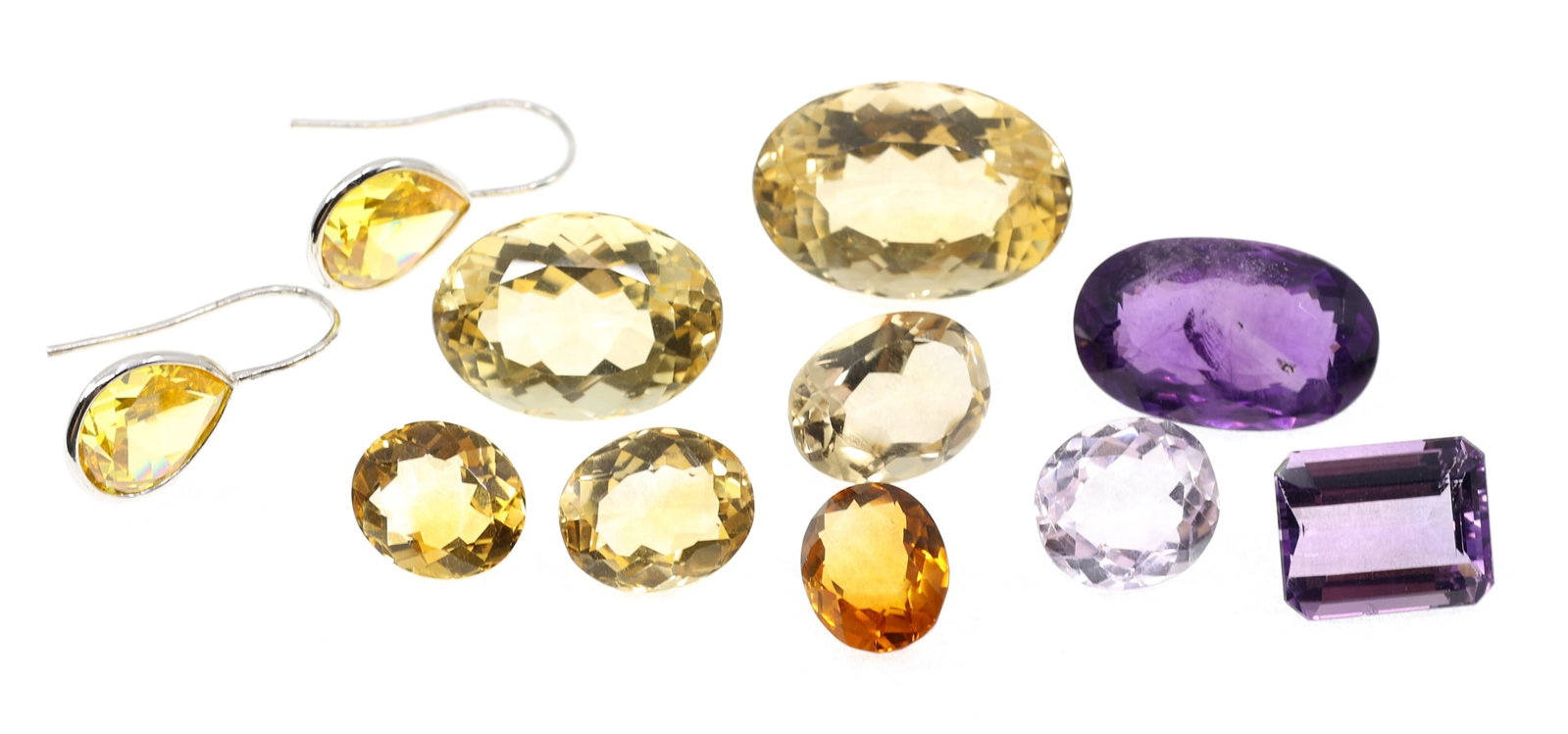 LOOSE CITRINE & AMETHYST - ROUND, OVAL, RECTANGULAR: LOOSE CITRINE & AMETHYST - ROUND, OVAL, RECTANGULAR Loose faceted citrine and amethyst. Cuts are a mixture of round, oval, and rectangular. IMPORTANT NOTE - PLEASE READ: REGARDING OUR IN-HOUSE S