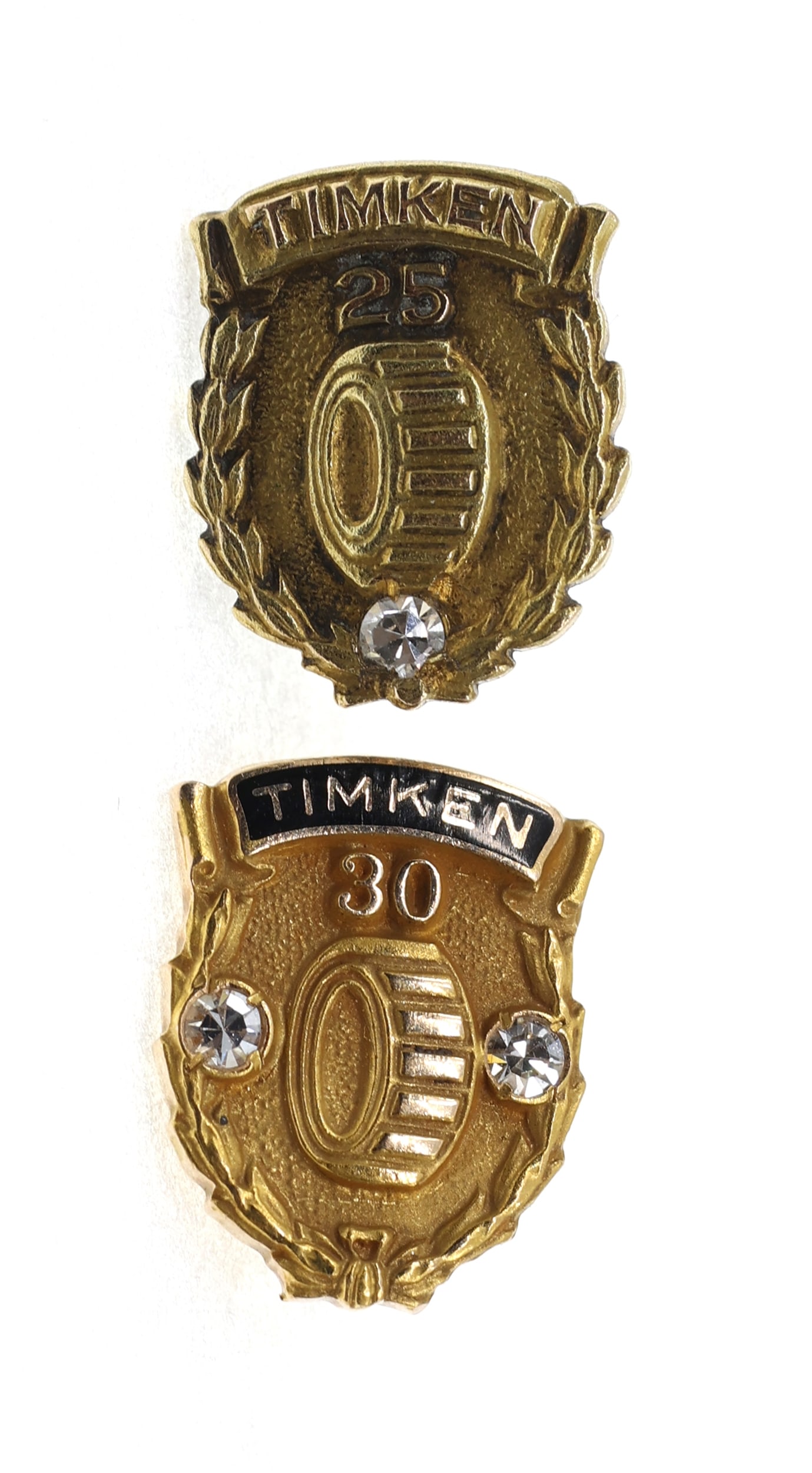10K YELLOW GOLD & DIAMOND TIMKEN EMPLOYEE SERVICE PINS: 10K YELLOW GOLD & DIAMOND TIMKEN EMPLOYEE SERVICE PINS 10K yellow gold Timken employee service pins: 25-year One 0.03 ct round white diamond 30-year (2) 0.03 ct round white diamonds Weight:
