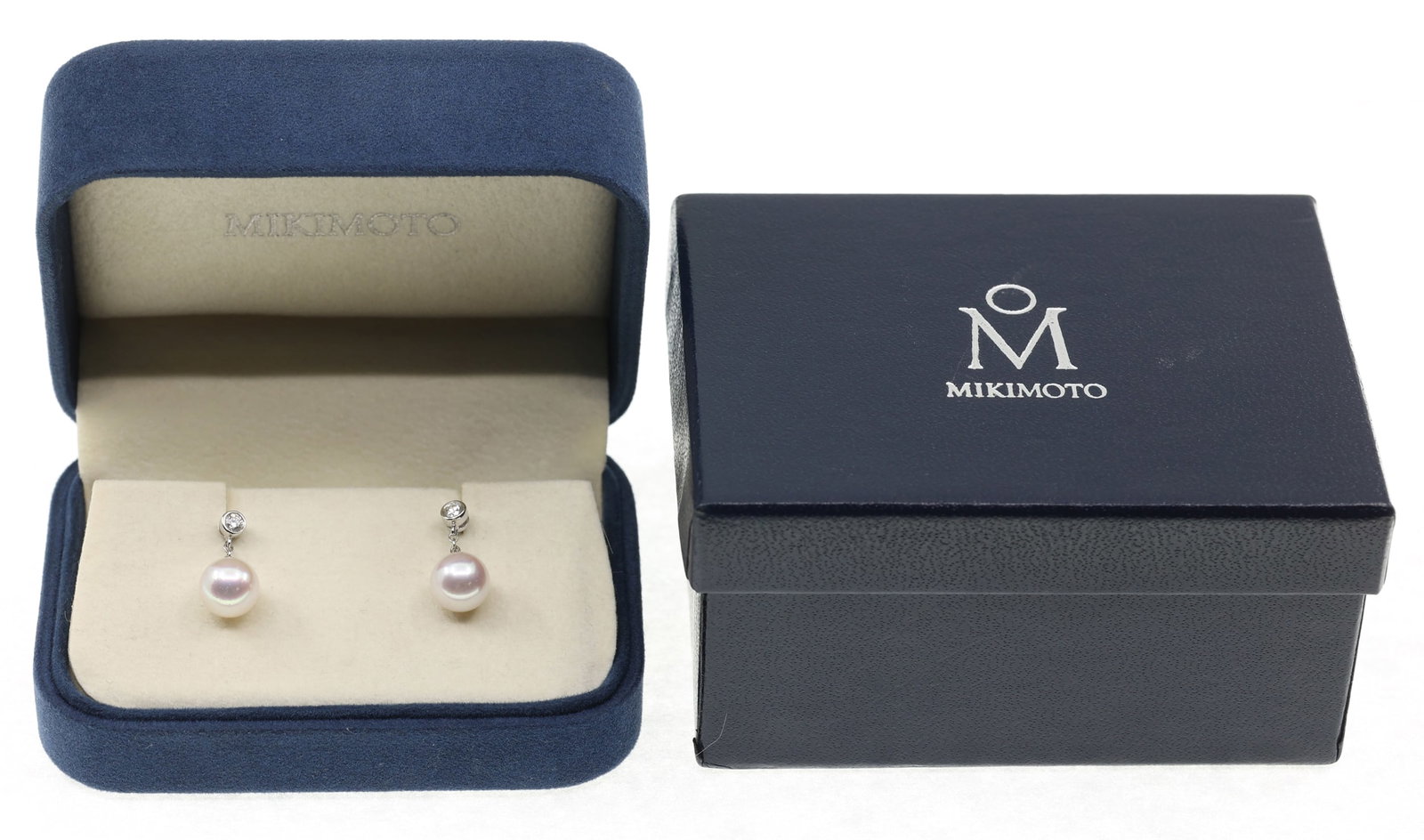 18K WHITE GOLD MIKIMOTO PEARL & DIAMOND DROP EARRINGS: 18K WHITE GOLD MIKIMOTO PEARL & DIAMOND DROP EARRINGS Mikimoto 18K white gold diamond and pearl drop earrings: Each with: 0.11 ct round white diamond 8mm 