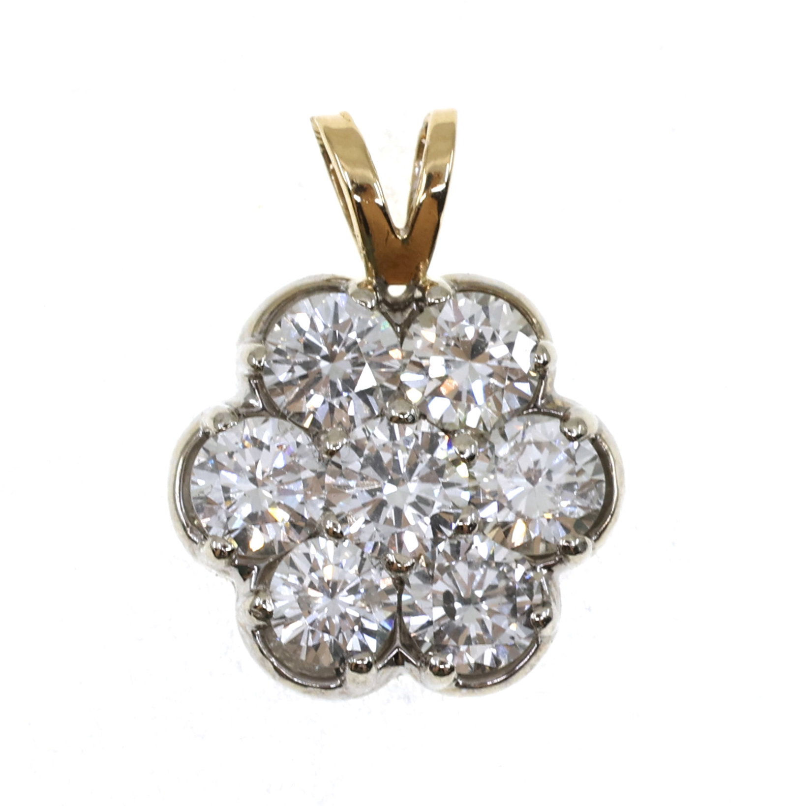 14K YELLOW GOLD 0.77 CTW DIAMOND FLOWER DESIGN PENDANT: 14K YELLOW GOLD 0.77 CTW DIAMOND FLOWER DESIGN PENDANT 14K yellow gold flower design pendant: Diamonds (7) 0.11 ct round cut Size: 11mm Weight: 2g IMPO