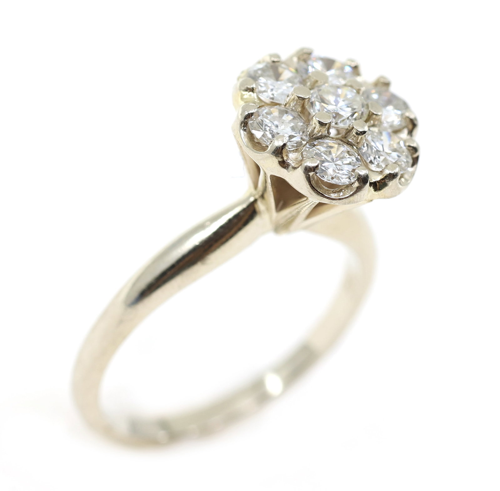 14K WHITE GOLD 0.80 CTW DIAMOND COCKTAIL RING: 14K WHITE GOLD 0.80 CTW DIAMOND COCKTAIL RING 14K white gold cocktail ring: Diamonds, 0.80 ctw 0.14 ct round (6) 0.11 ct round Size: 6 Weight: 4g