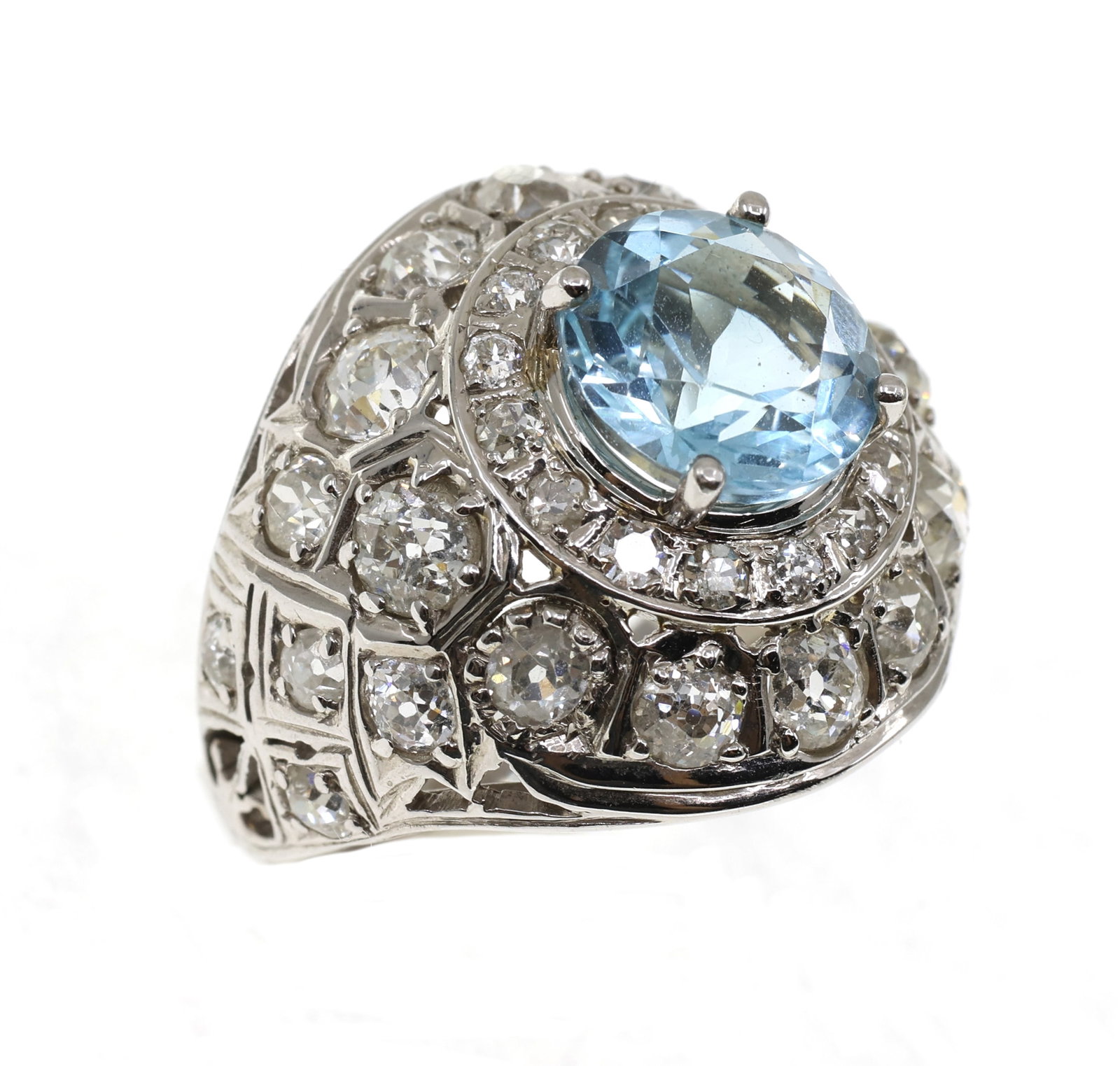 14K WHITE GOLD TOPAZ & 4.18 CTW DIAMOND COCKTAIL RING: 14K WHITE GOLD TOPAZ & 4.18 CTW DIAMOND COCKTAIL RING 14K white gold cocktail ring: Blue topaz 10mm round Diamonds, 4.18 ctw (12) 0.28 ct (