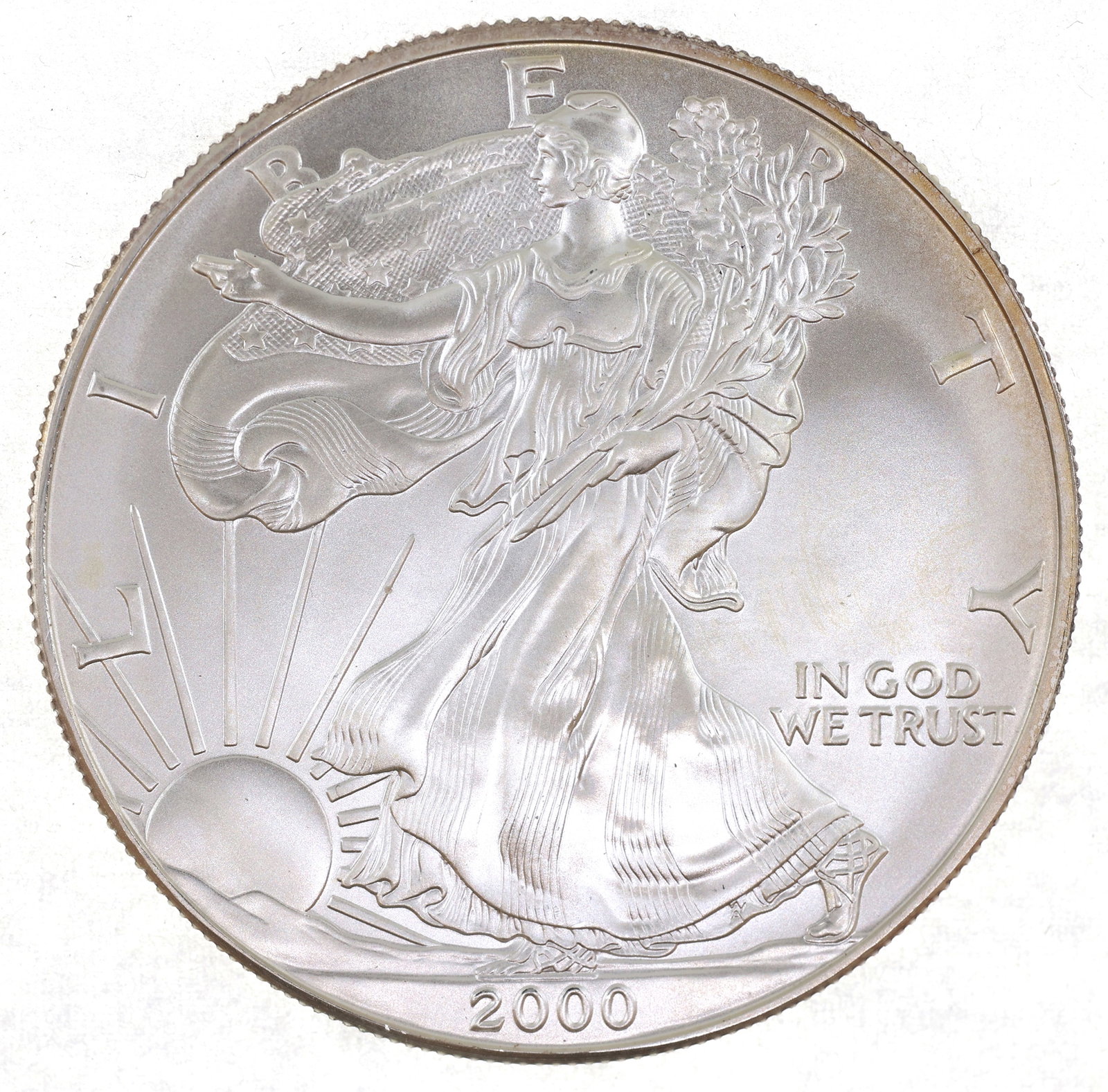 2000 US SILVER EAGLE $1 COIN - DIE ERROR: 2000 US SILVER EAGLE $1 COIN - DIE ERROR 2000 United States .999 silver Eagle $1 coin, uncirculated, with a die error on Lady Liberty's ear. IMPORTANT NOTE - PLEASE READ: REGARDING OUR IN-HOUSE