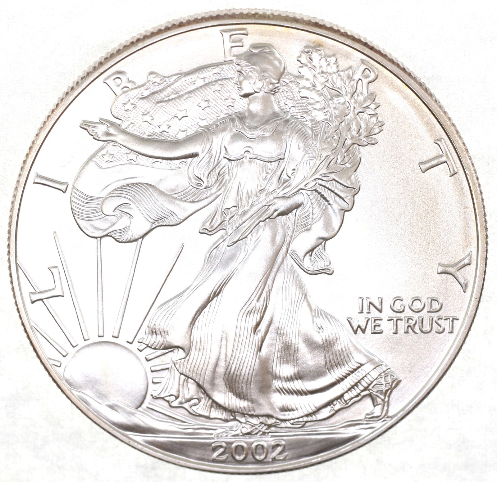 2002 US SILVER EAGLE $1 COIN - UNC: 2002 US SILVER EAGLE $1 COIN - UNC 2002 United States .999 silver Eagle $1 coin, uncirculated. IMPORTANT NOTE - PLEASE READ: REGARDING OUR IN-HOUSE SHIPPING & INVOICING Shipping: Auctioneers no