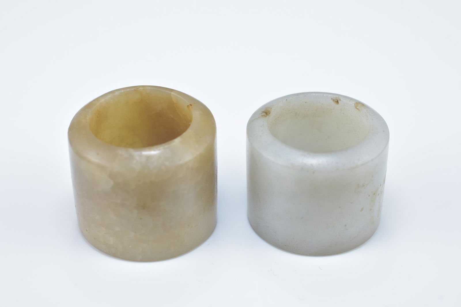 Two Chinese carved jade archers rings. 2.5cm and 3cm (1 of 3)