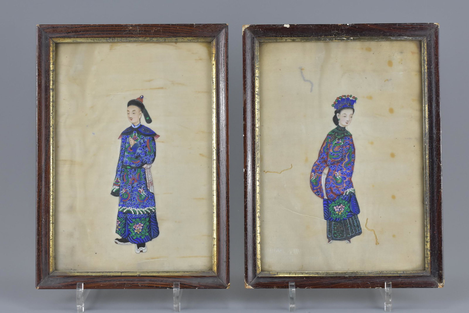 Two Chinese mid 19th century framed rice paper: Two Chinese mid 19th century framed rice paper paintings of Mandarin man and woman. 'William Andrew, China HMS Beagle 1861' written to reverse of one. 20cm x 28cm (2)