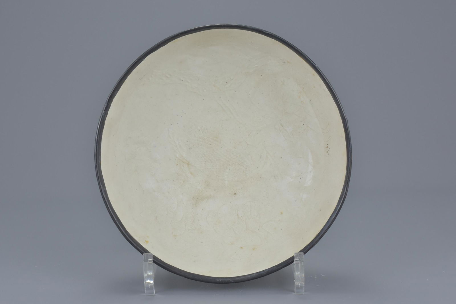 A Chinese Song dynasty (960-1279) white glazed Ding (1 of 8)
