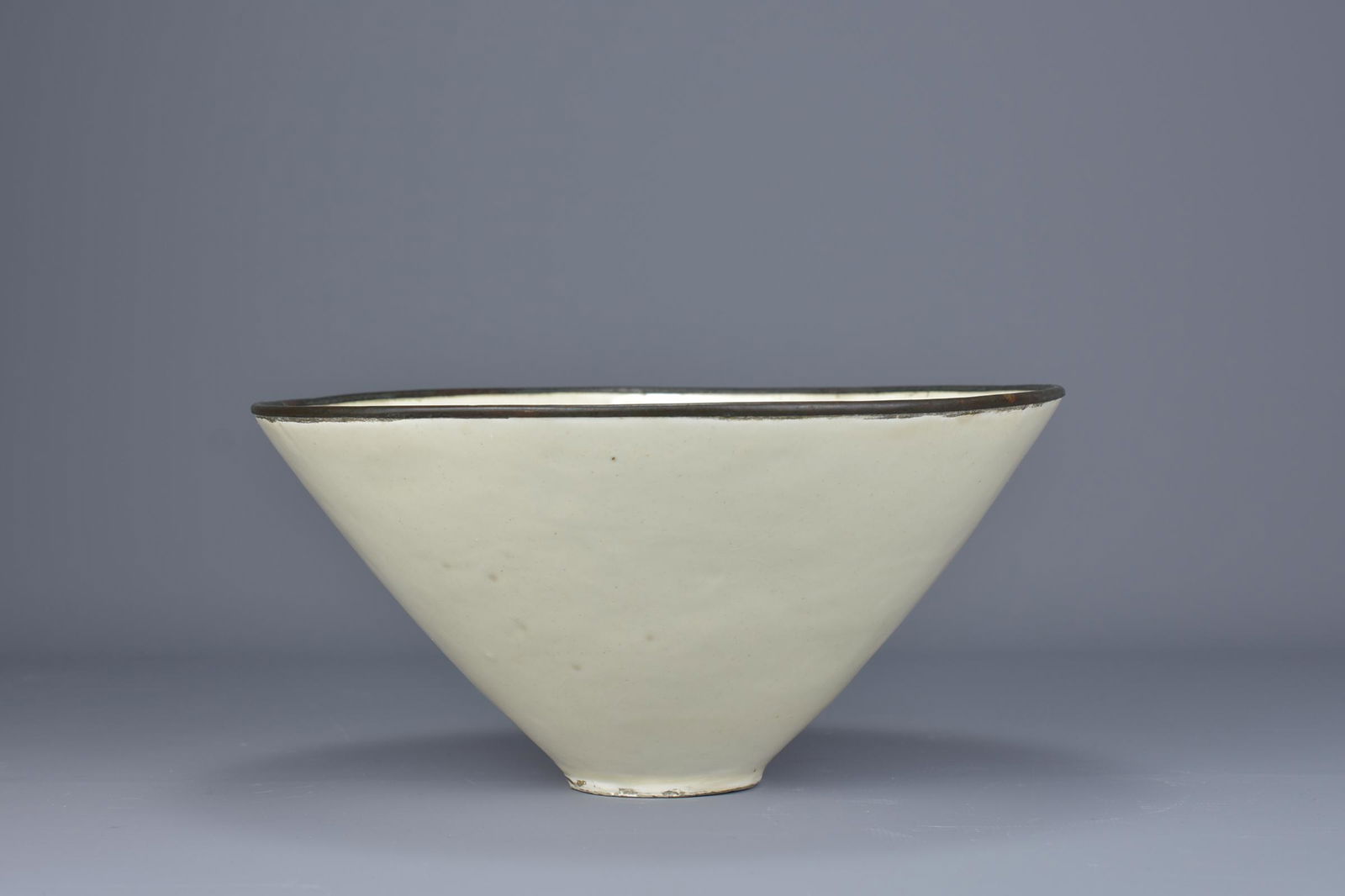 A Chinese Ding-type phoenix bowl, Yuan / Ming dynasty (1 of 9)