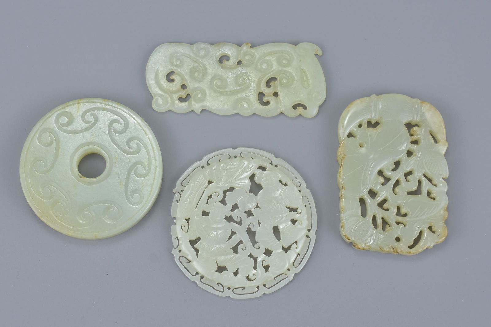 Four Chinese carved celadon jade pendants. 5Cm - 6cm (1 of 3)