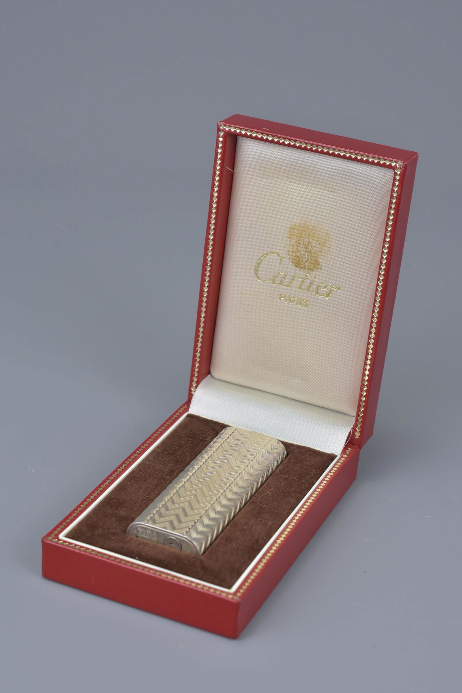 A Cartier Paris silver-plated lighter in original (1 of 6)