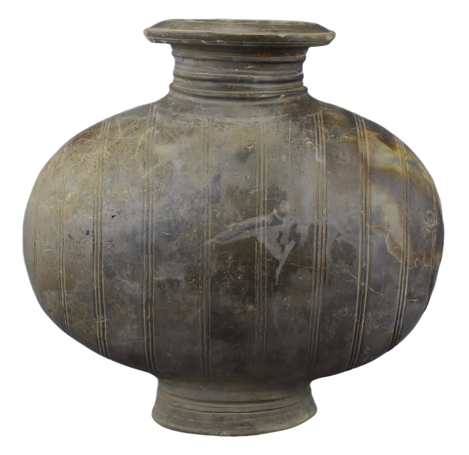 A Fine Chinese Qin or Western Han Dynasty Burnished: A Fine Chinese Qin or Western Han Dynasty Burnished Pottery Cocoon Jar. The body decorated with twelve bands of vertically triple-incised bands and pronounced ridges surrounding the neck and base. The